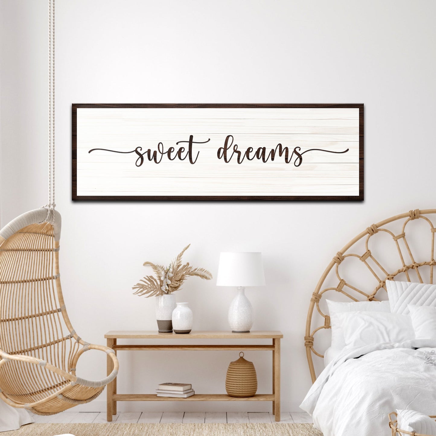 Bedroom with 'sweet dreams' sign, hanging chair, and nightstand.