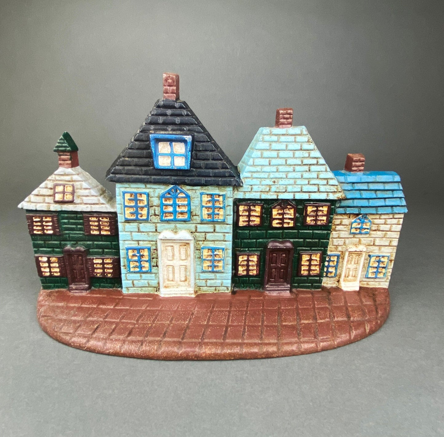 Door Stopper Shaped like Row of Houses. Vintage, Cast Iron Stopper.
