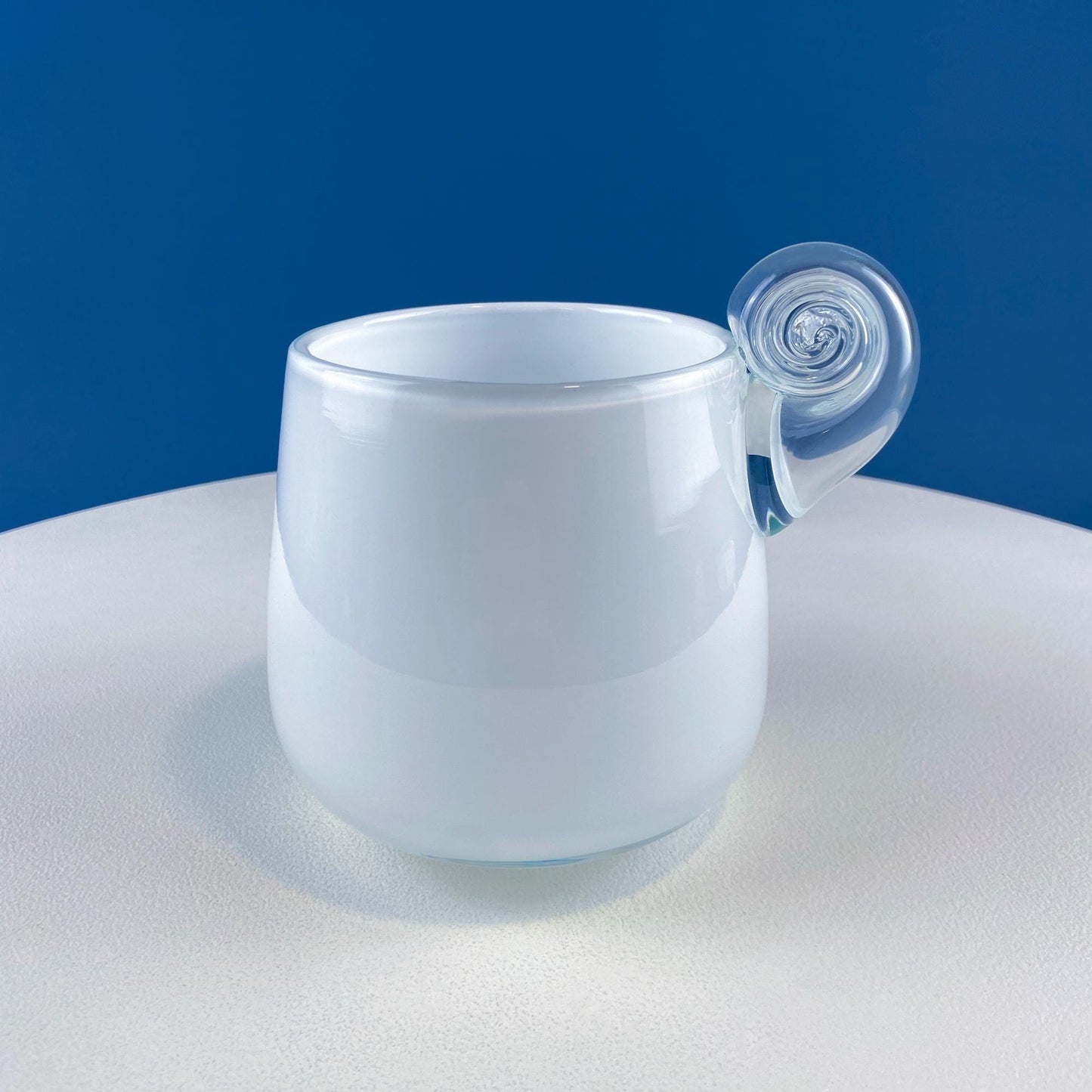 Modern White & Clear Glass Vase with Swirl Handle. Unique White Cased Hand Blown Art Glass with Scroll. Bath Storage. Interior Design Ideas.