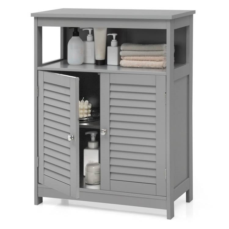 Gray cabinet with open doors displaying bathroom items on a white background