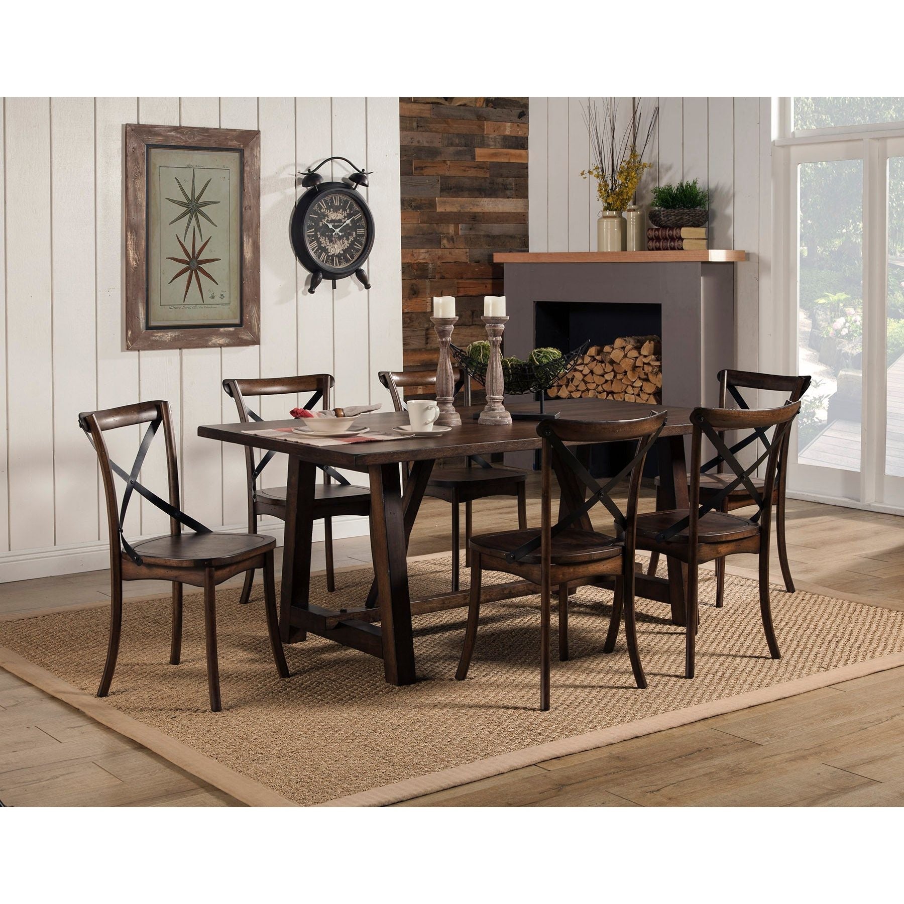 Arendal Trestle Dining Table set in rustic industrial style with metal cross-back chairs in a cozy dining room.