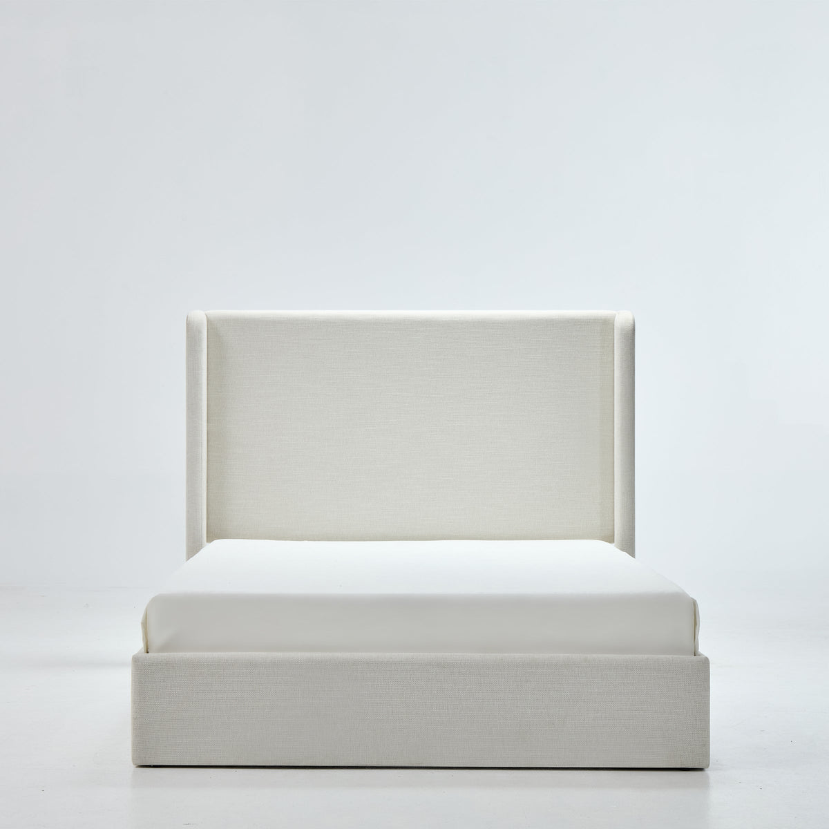 Carmen Upholstered Wingback Bed