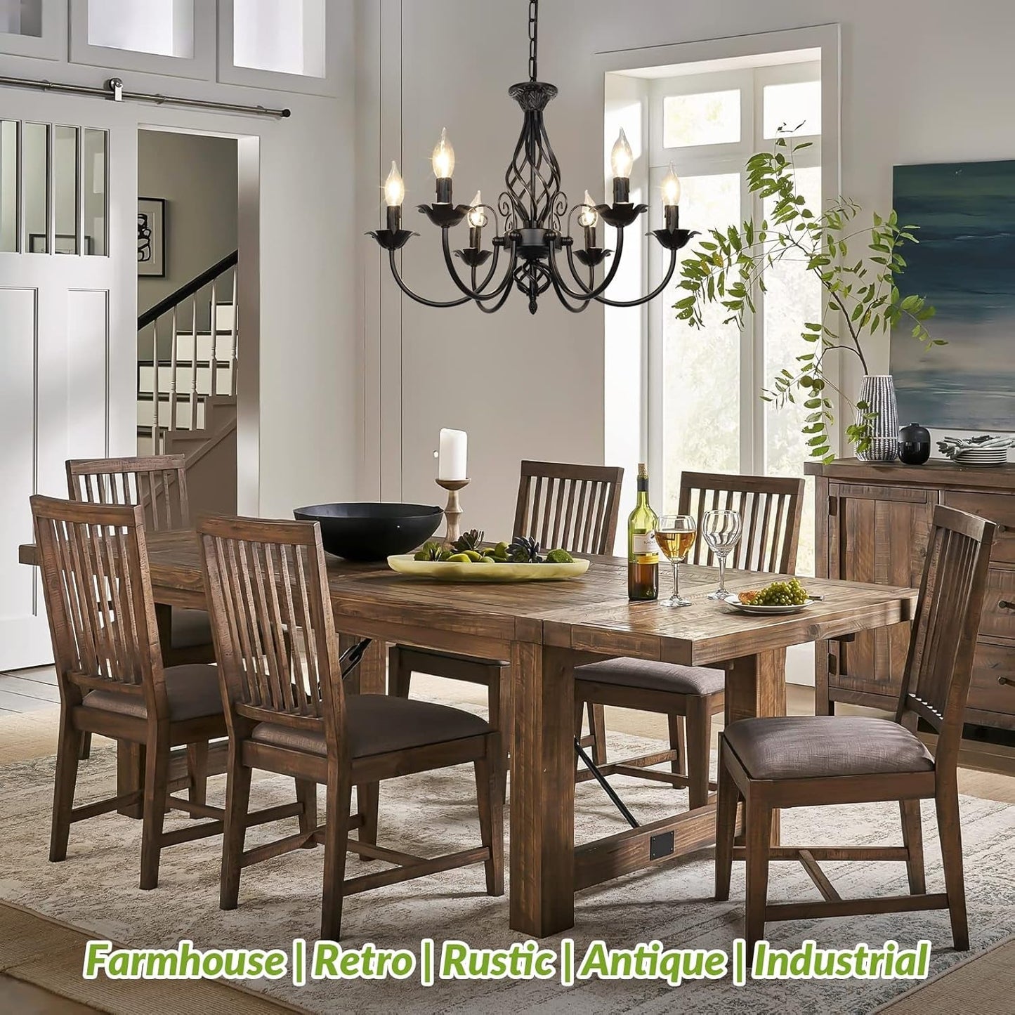 Six Light Matte Black Farmhouse Ceiling Chandelier Fixture illuminating a dining room with rustic wooden furniture.