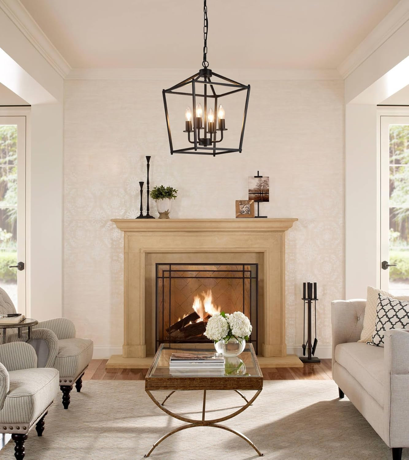 UL Black Industrial Lantern Chandelier 4 Light Pendant hanging in a modern living room with a fireplace and stylish decor.