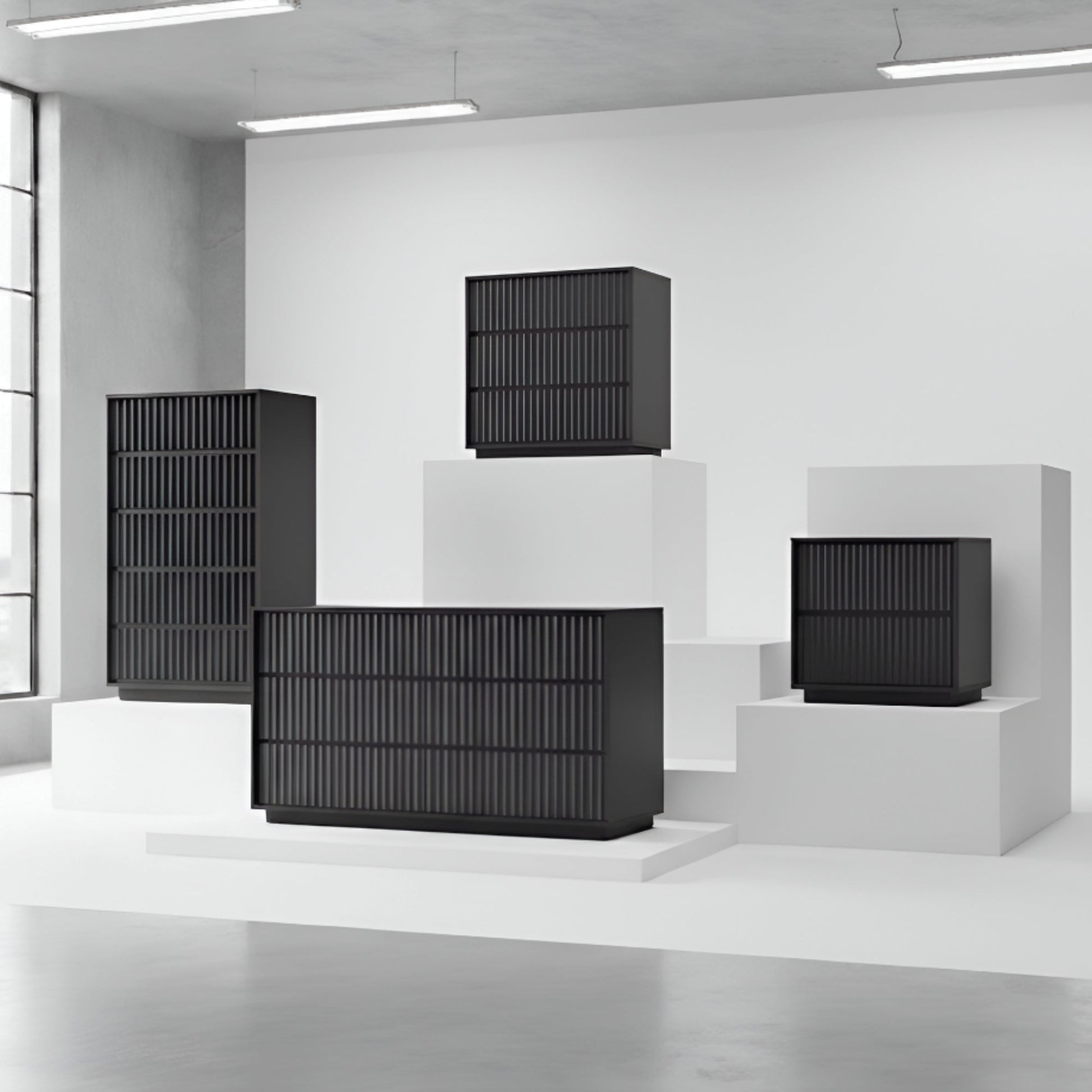 Blanca Chest, Black displayed in a modern interior setting with multiple storage pieces.