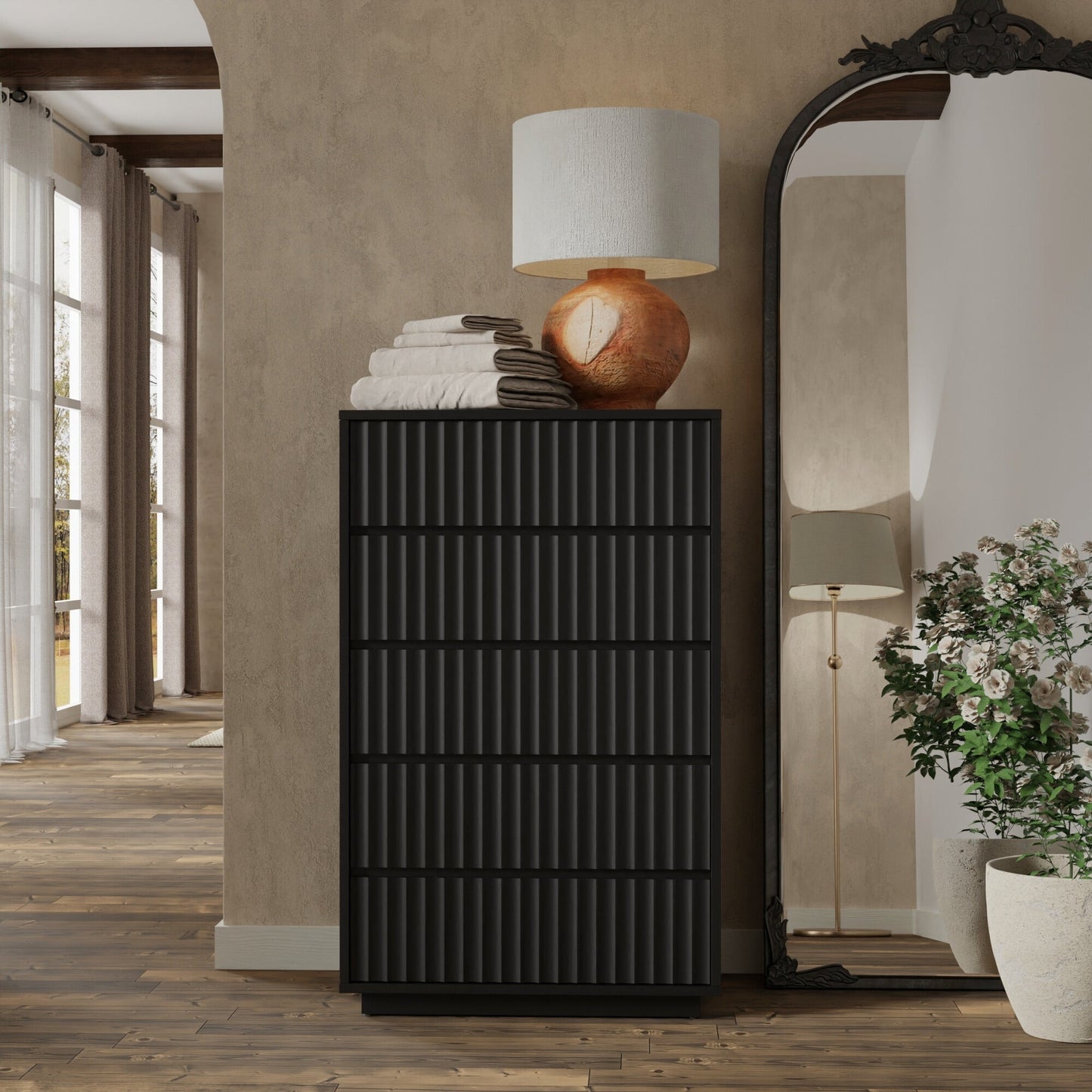 Blanca Chest, Black showcased in elegantly designed room with lamp and mirror.