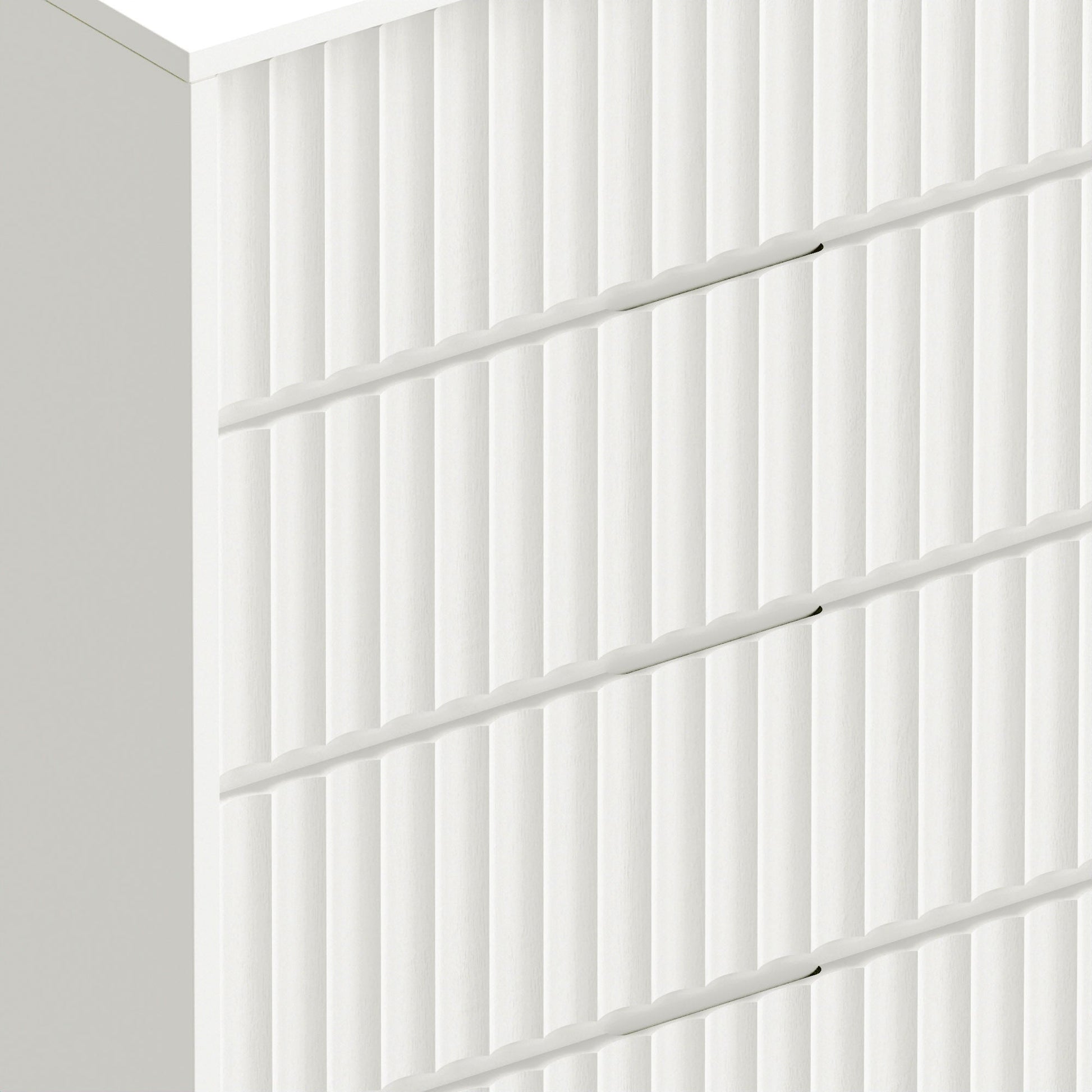 Blanca Chest, a white 5-drawer piece with elegant scalloped design and handcrafted details.