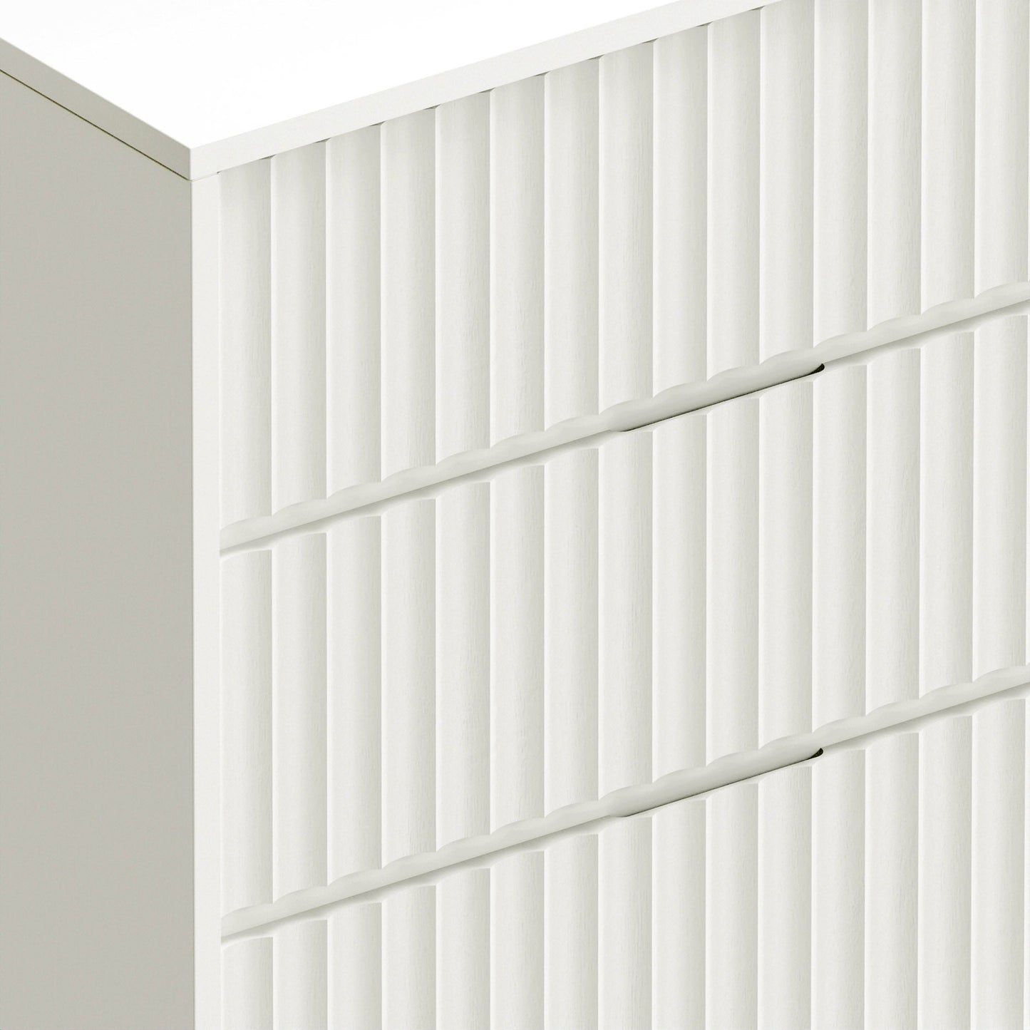 Detail of the Blanca Small Chest showcasing the elegant scalloped design and white finish.