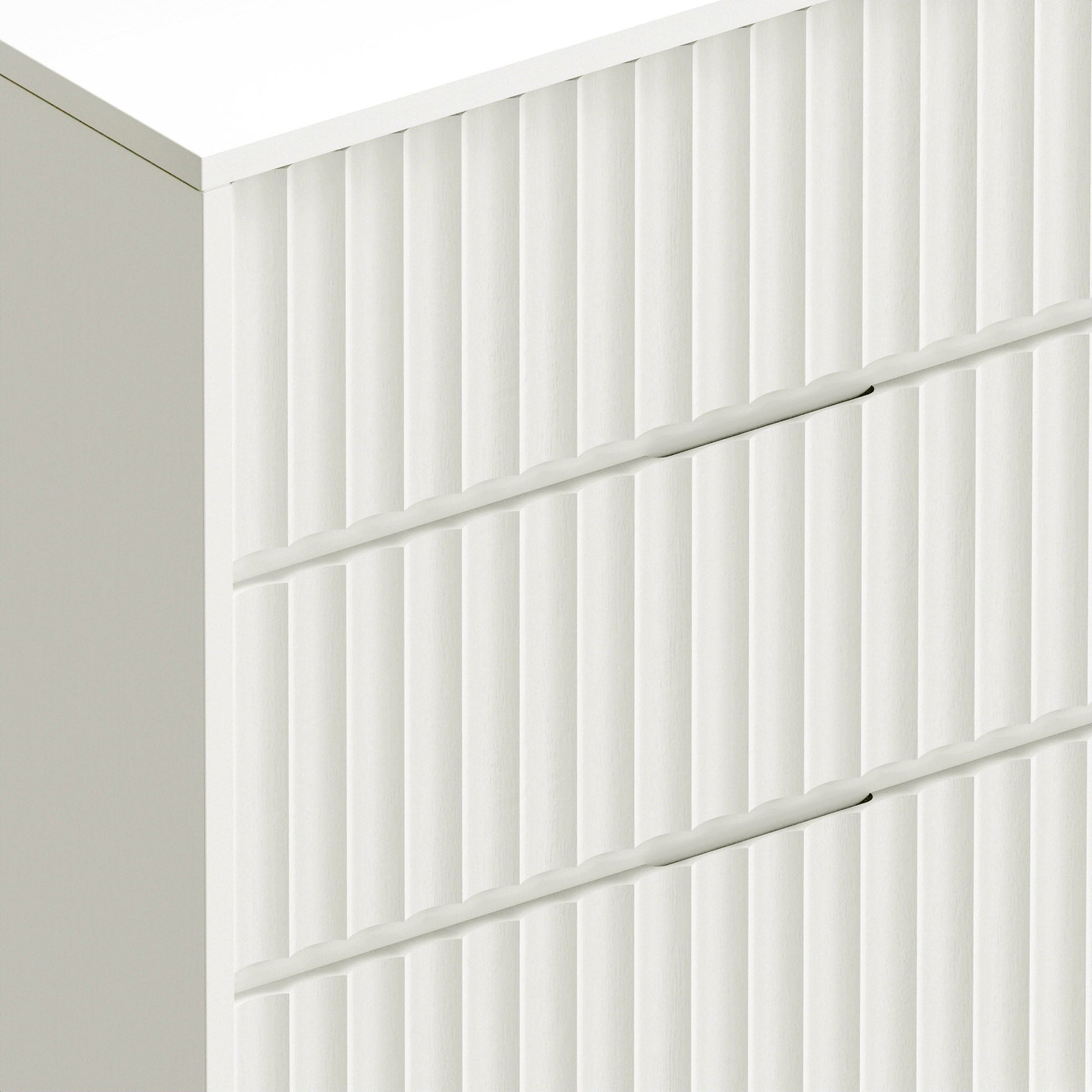 Detail of the Blanca Small Chest showcasing the elegant scalloped design and white finish.