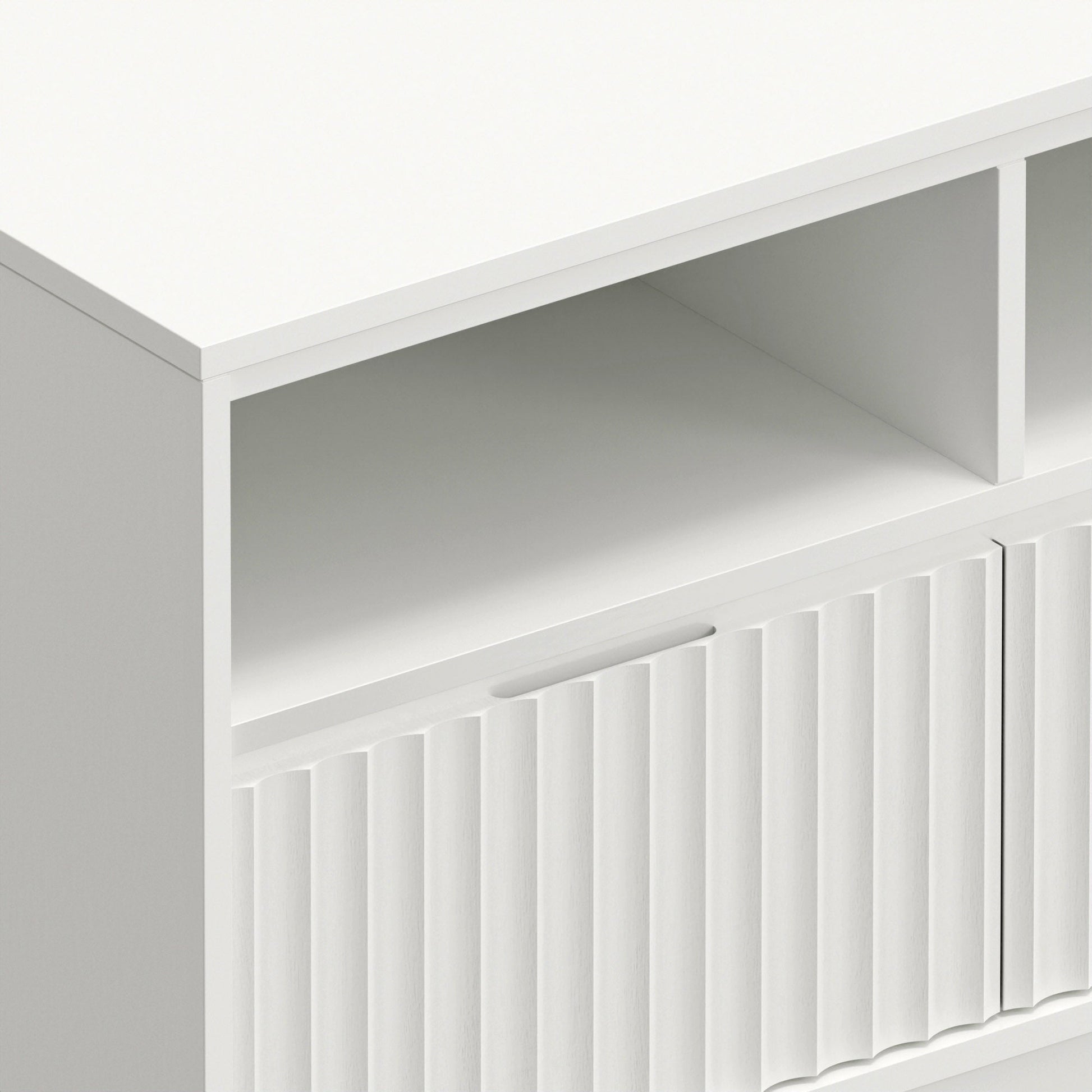 Close-up of the Blanca TV Console in white, showcasing its shelves and textured cabinet doors.