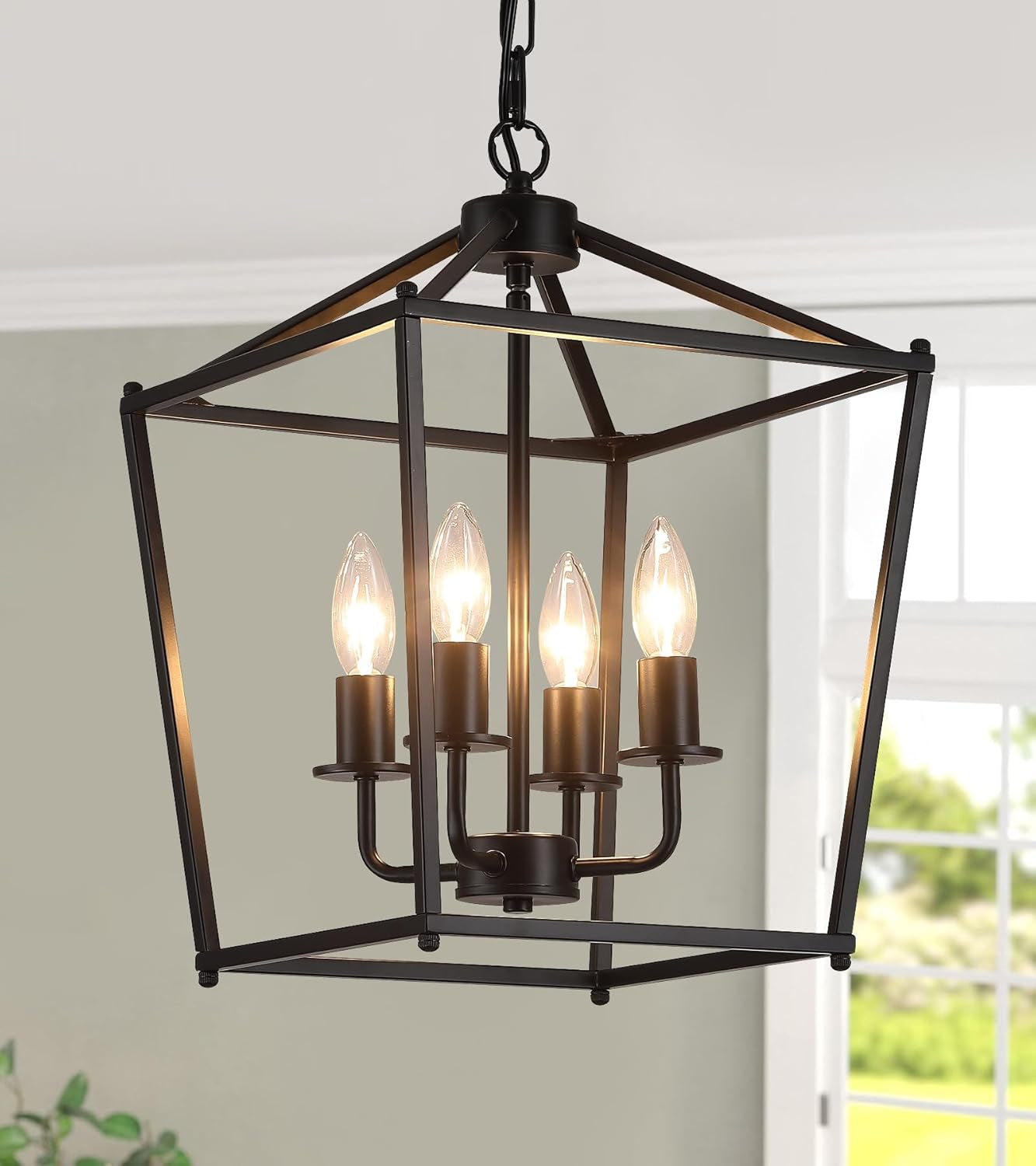 UL Black Industrial Lantern Chandelier 4 Light Pendant in a modern kitchen setting with warm glow.