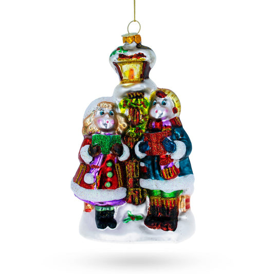 Carolers by a Vintage Lantern Glass Christmas Ornament