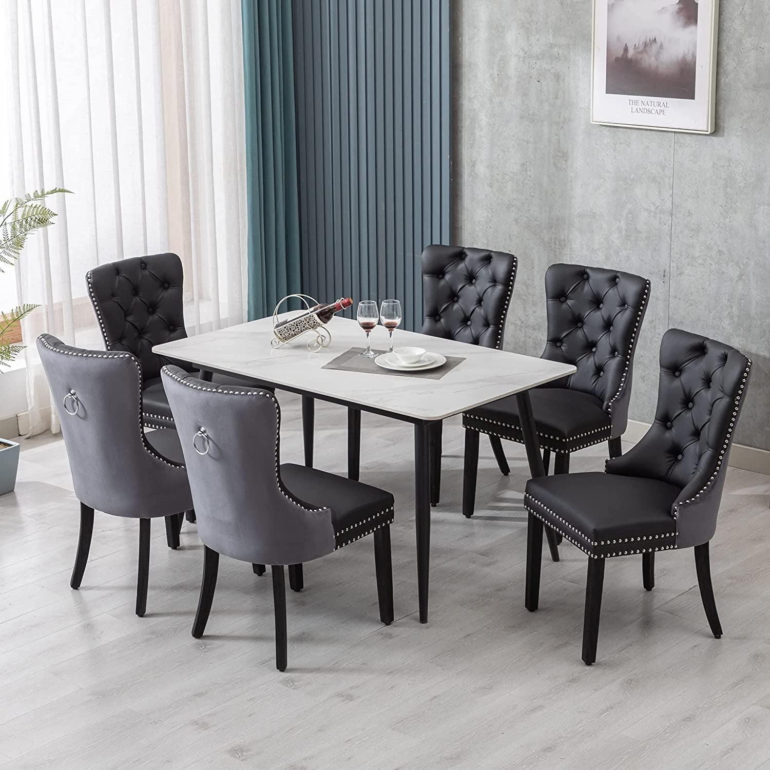 Velvet Dining Chairs Set Of 6 Black And Dark Grey Nailhead Trim around a modern dining table in a stylish interior.