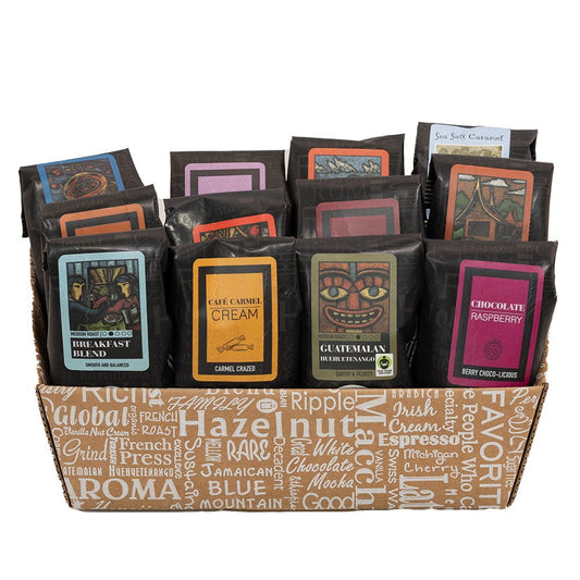 Indulgent Selection Gift Box featuring assorted flavored coffee samplers in a decorative basket.