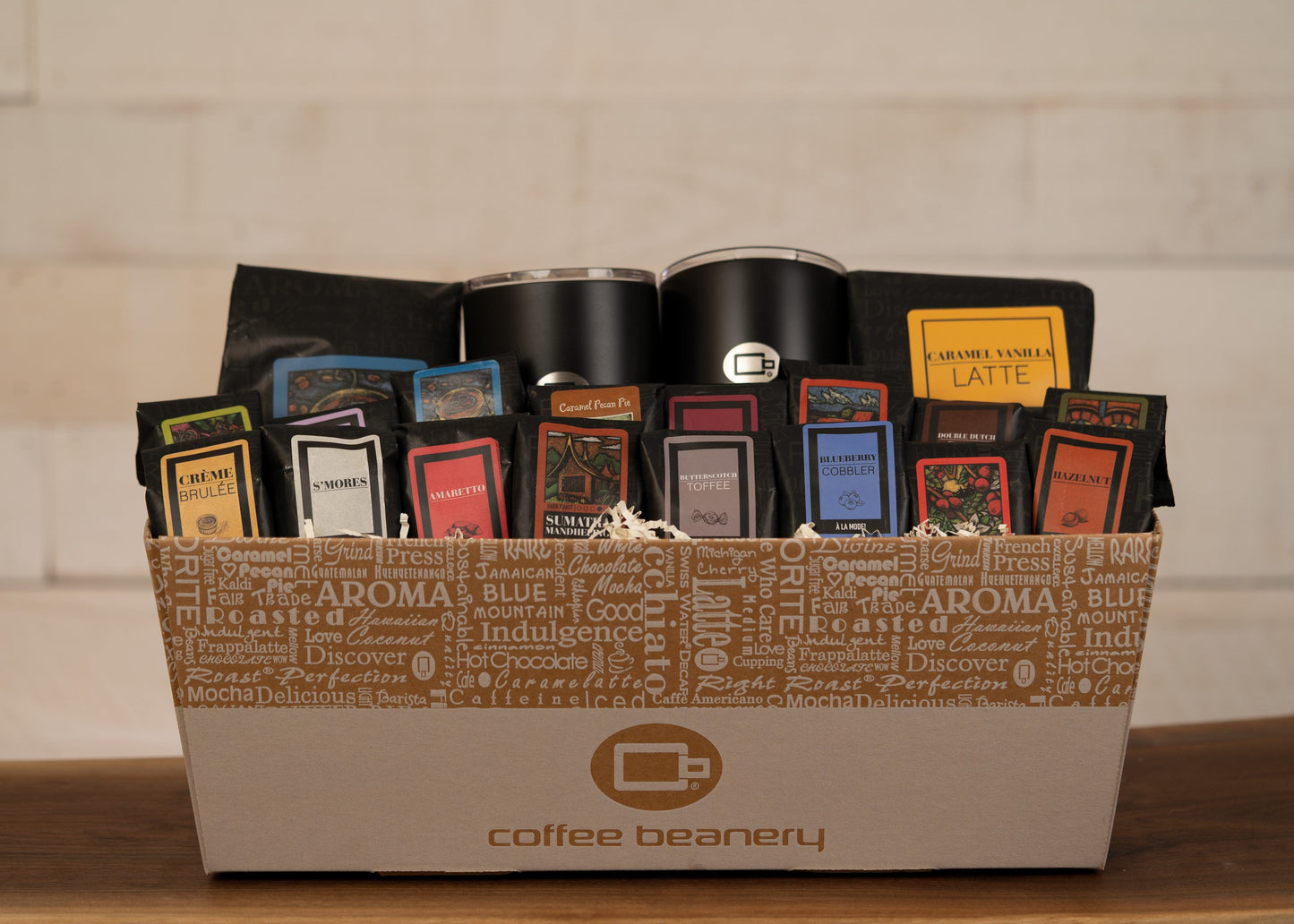 The VIP Coffee Gift Basket with gourmet coffee, travel mugs, and assorted flavored coffee packs.