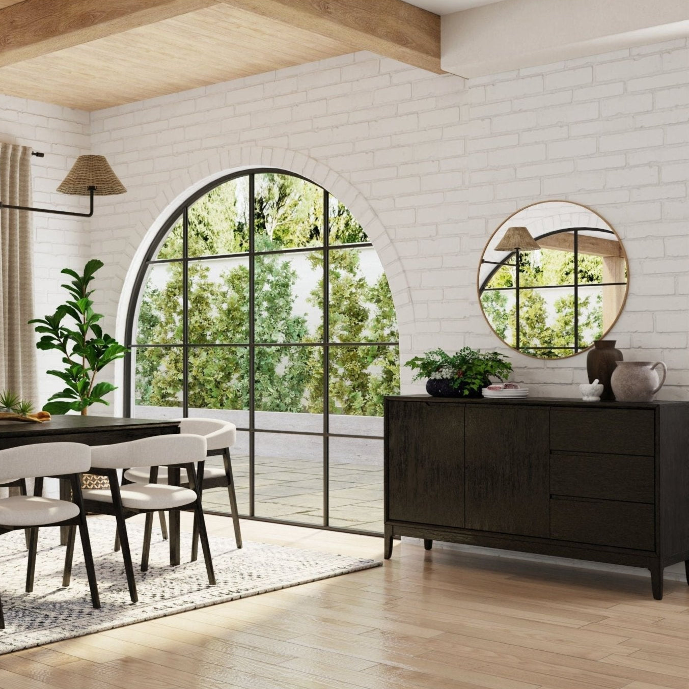 Cove Sideboard in a stylish dining room with natural light and greenery, featuring a vintage black finish and ample storage.