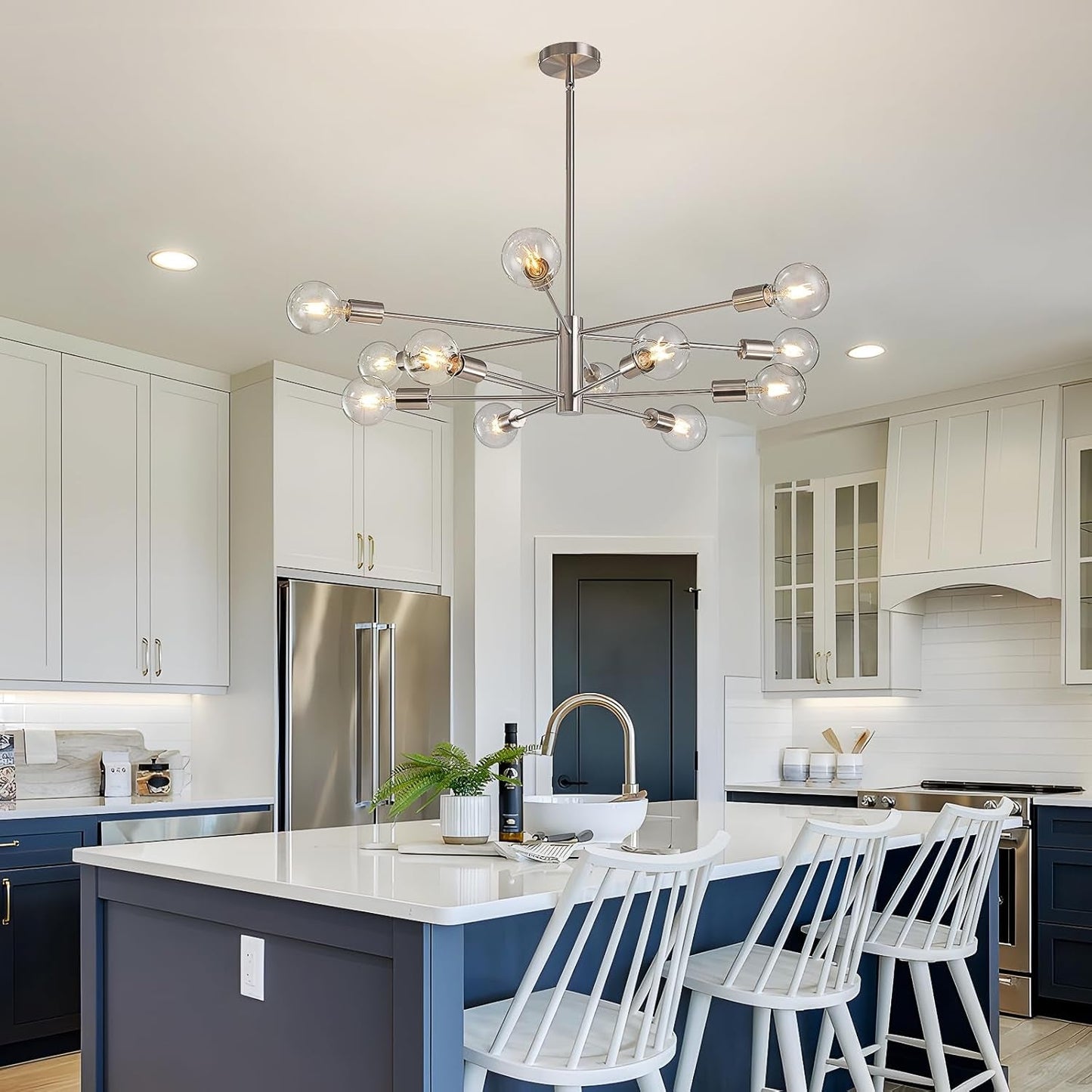 Sputnik 12 Light Brushed Nickel Chandelier For Dining Room illuminating a modern kitchen island.