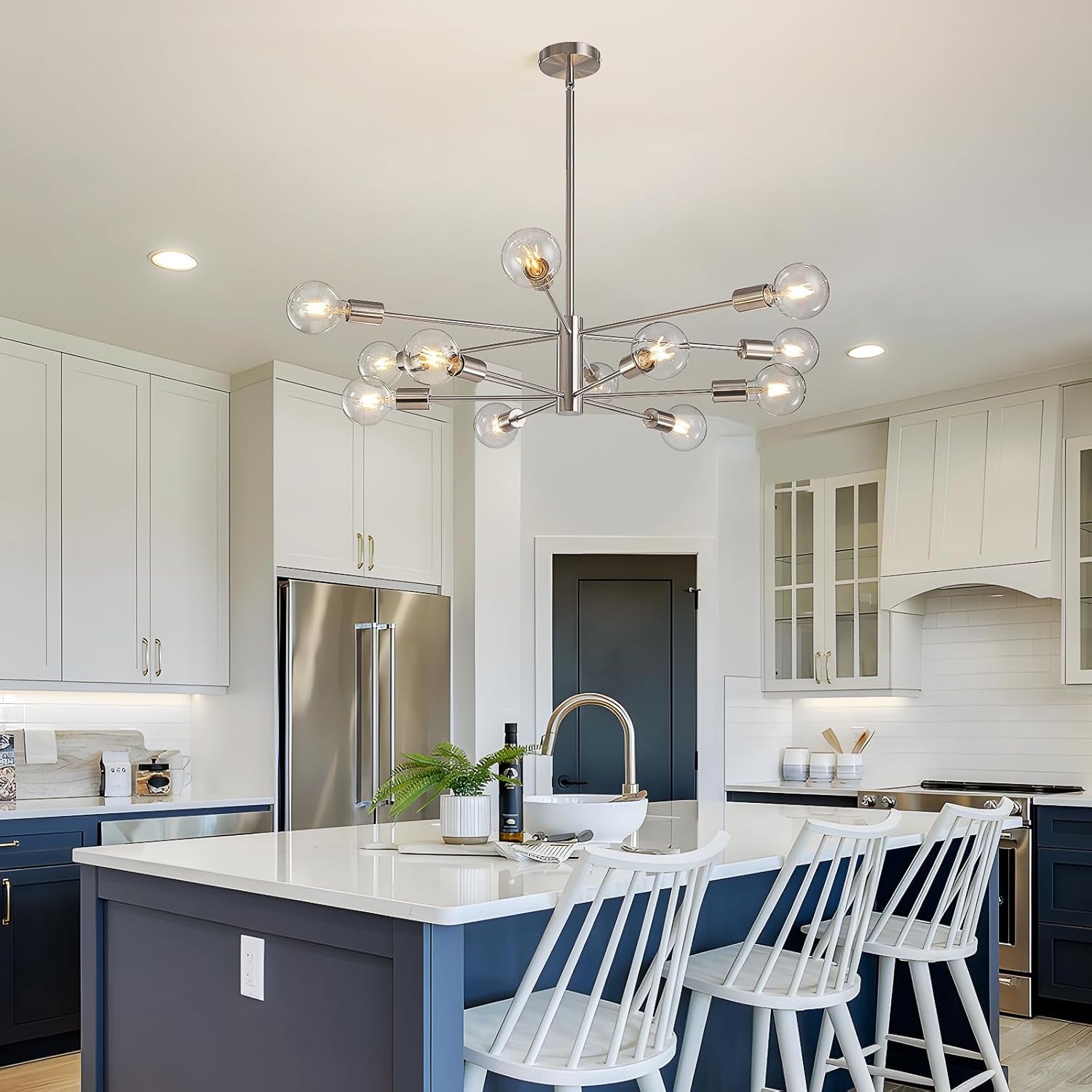 Sputnik 12 Light Brushed Nickel Chandelier For Dining Room illuminating a modern kitchen island.