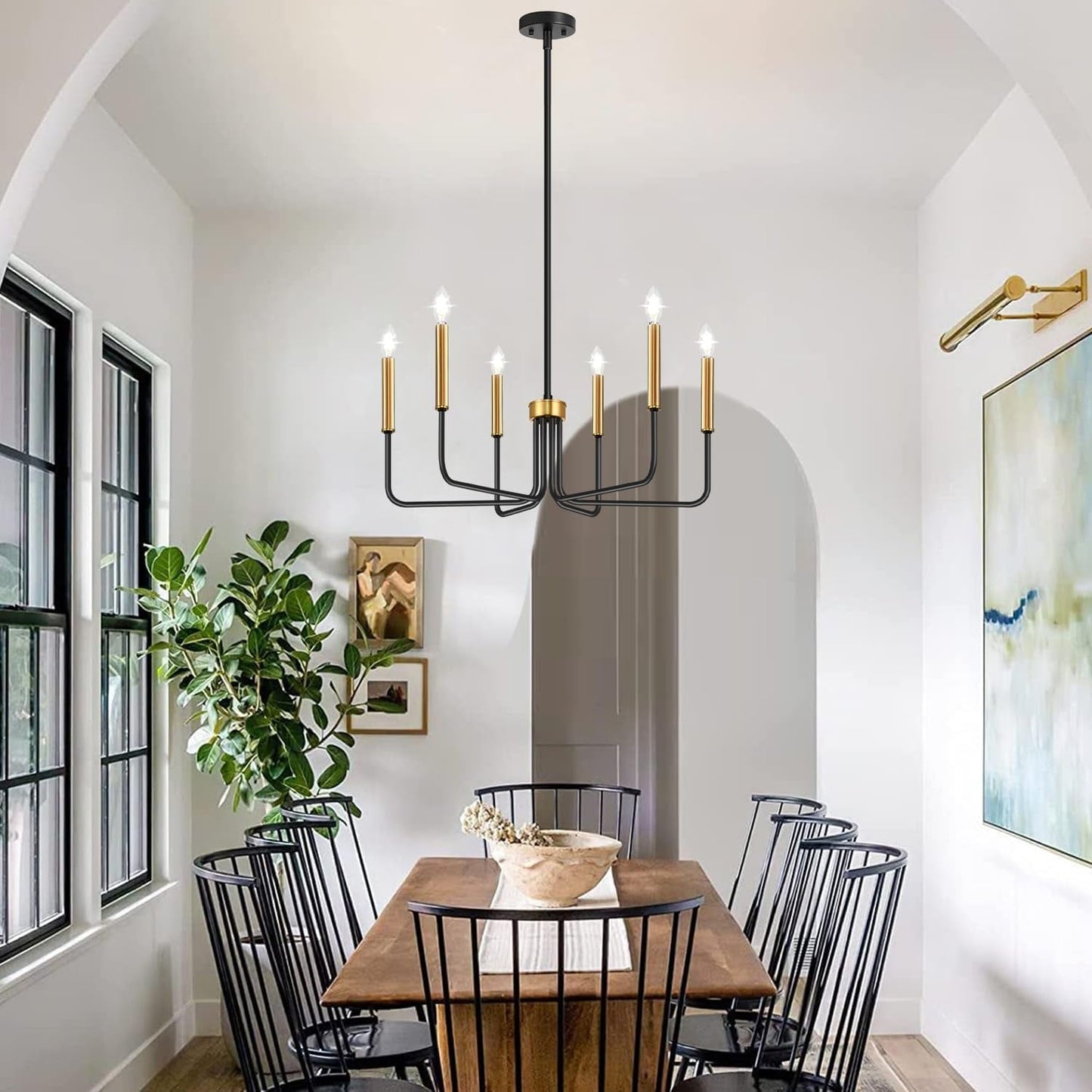 Black And Gold Six Light Farmhouse Chandelier For Dining Room illuminating a stylish dining space.