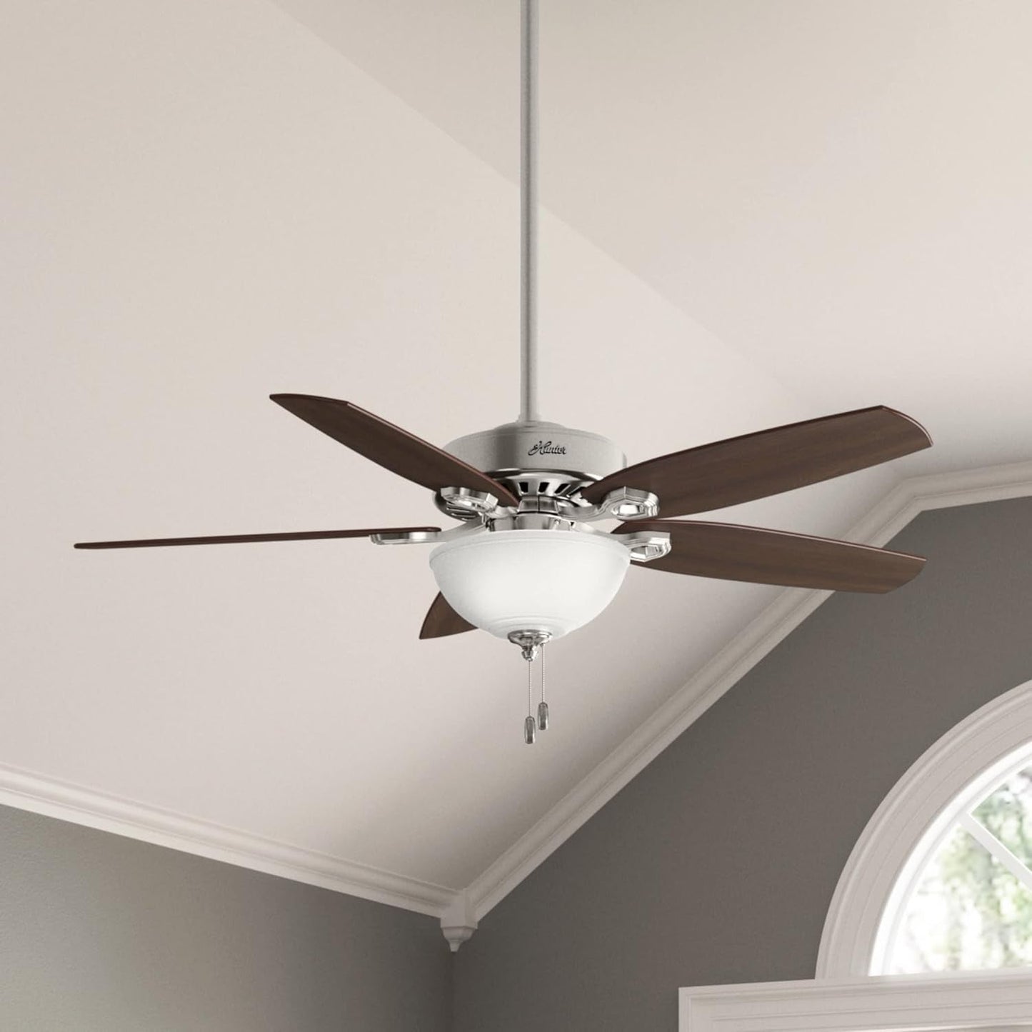 Builder Deluxe 52 Inch Brushed Nickel Indoor Ceiling Fan with toffee glass light shade.