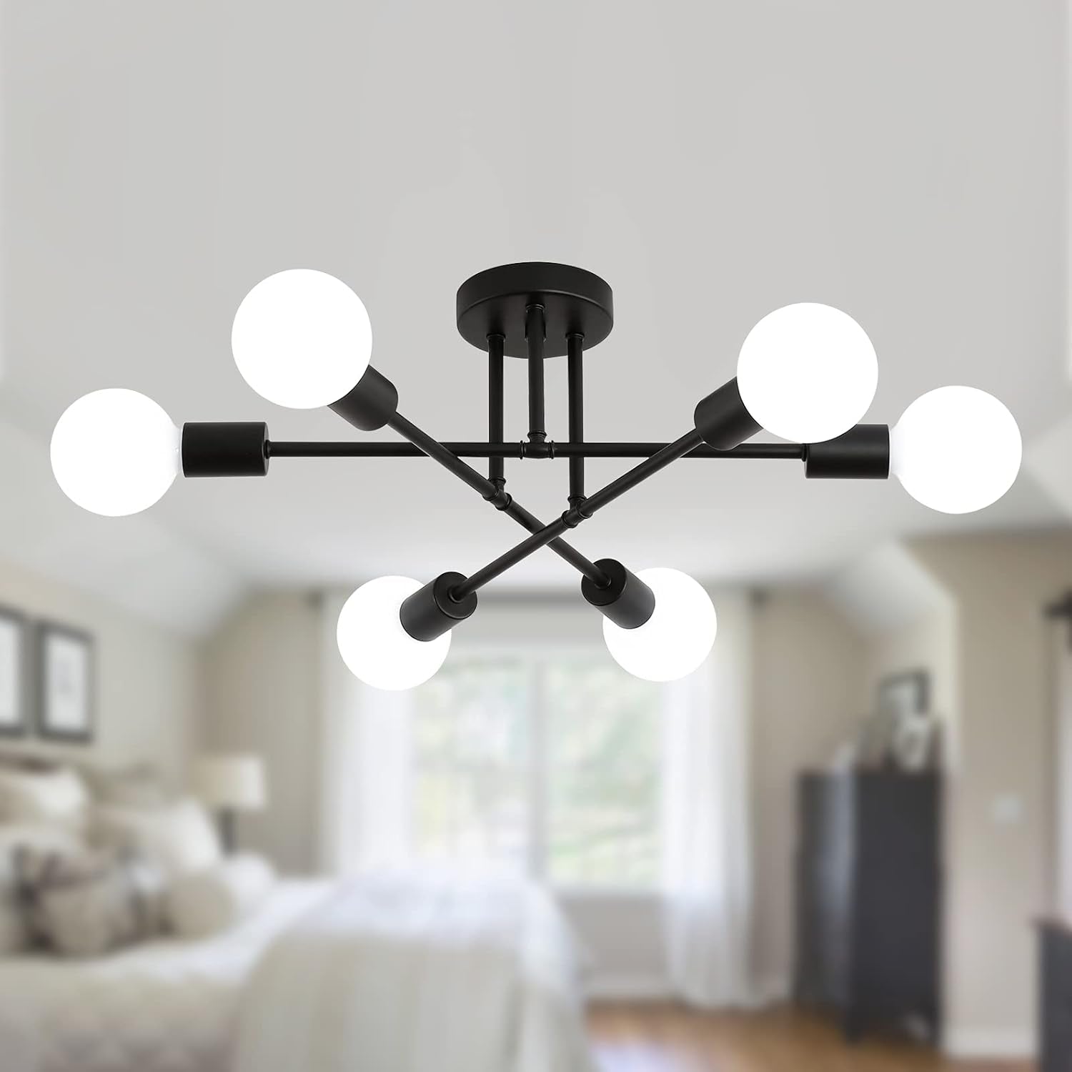 Modern ceiling light fixture with six white bulbs in a bedroom setting.