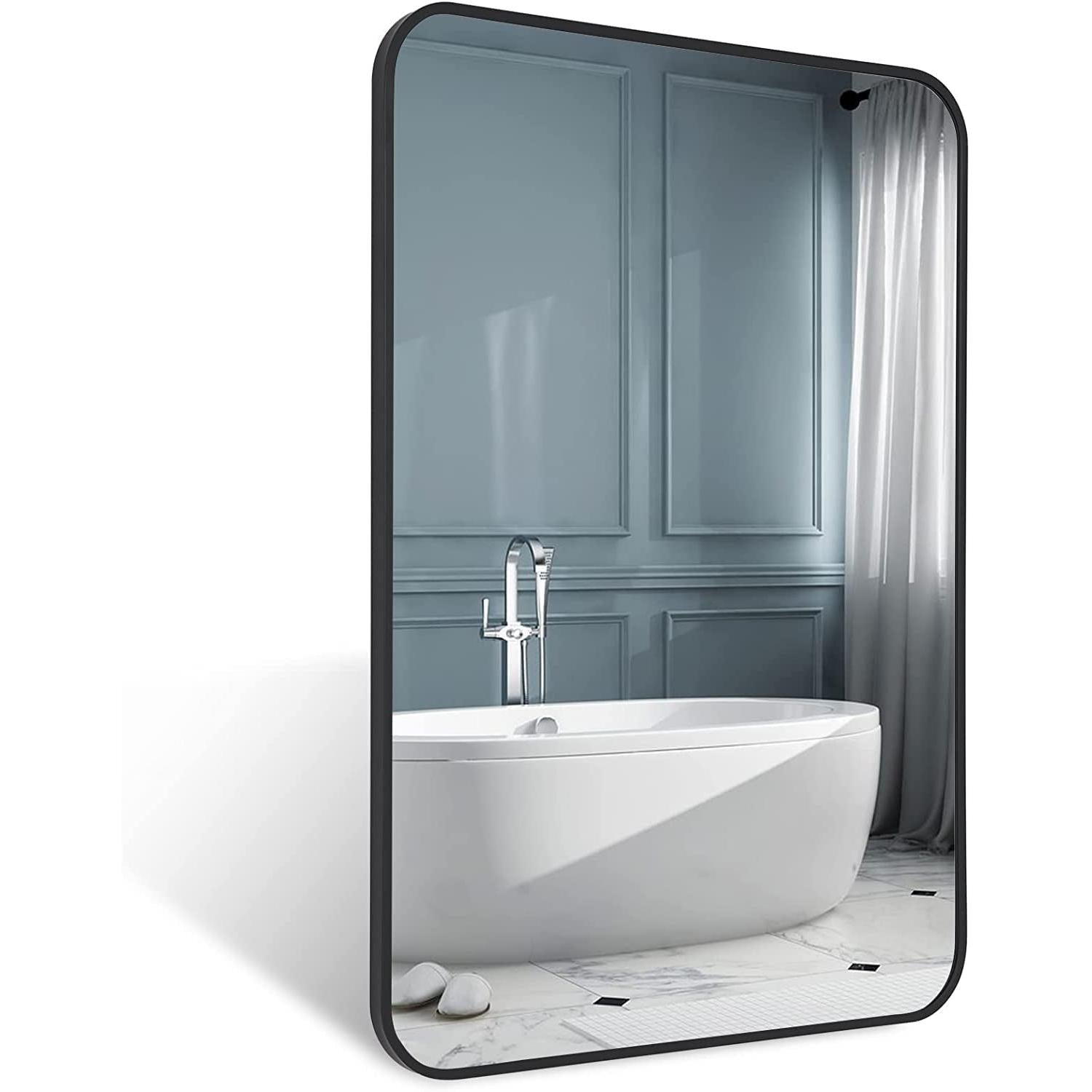 Black Metal Framed Bathroom Wall Mirror With Thin Frame reflecting a modern bathroom with a freestanding tub and soft curtains.