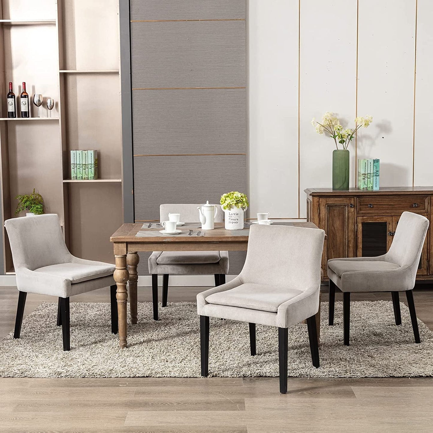 Beige Corduroy Dining Chairs With Wood Legs Set Of 6 around dining table in a stylish dining room.