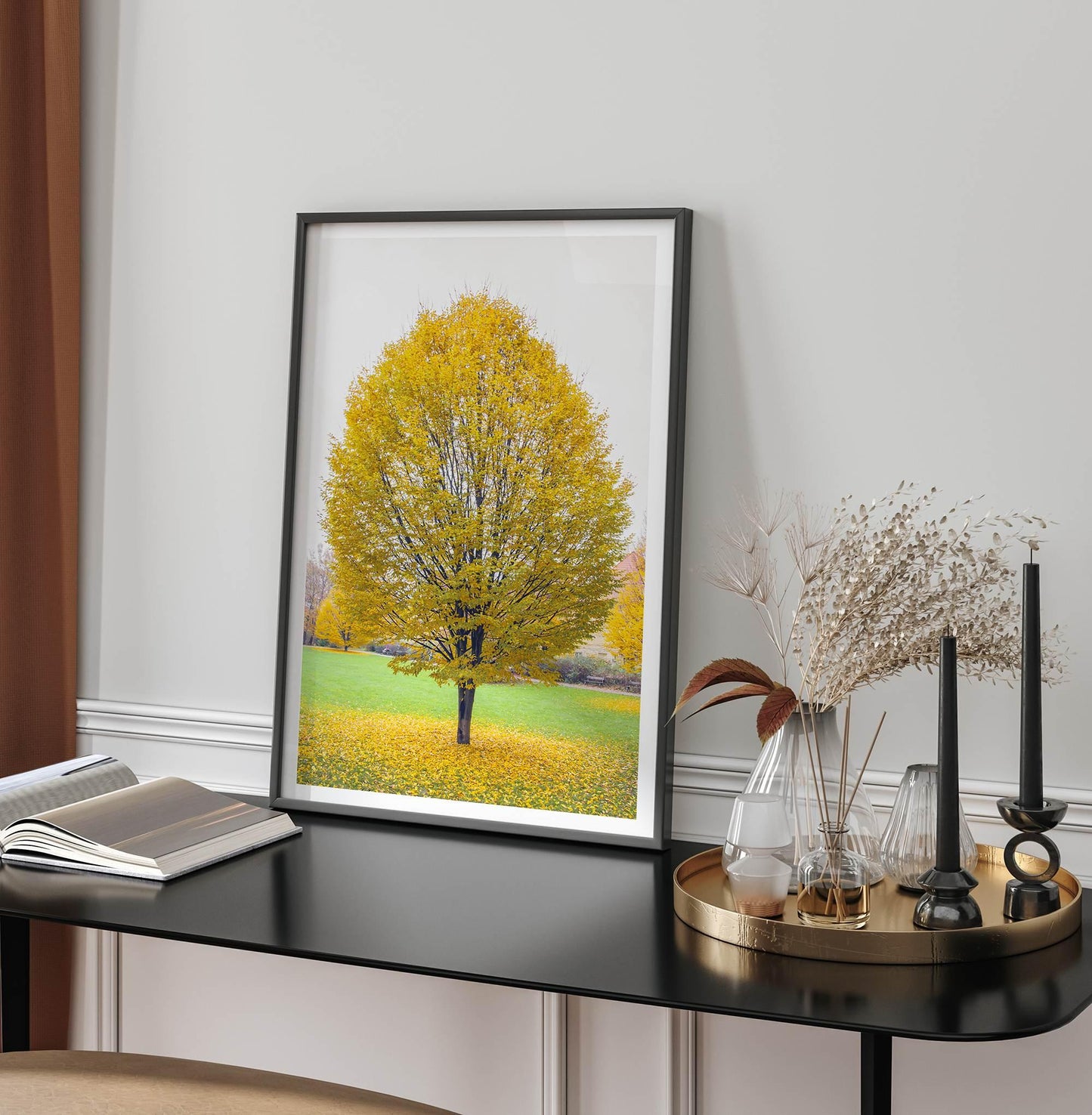 Golden Fall wall decor: solitary tree with vibrant yellow autumn leaves in a Prague park, bathed in golden light.