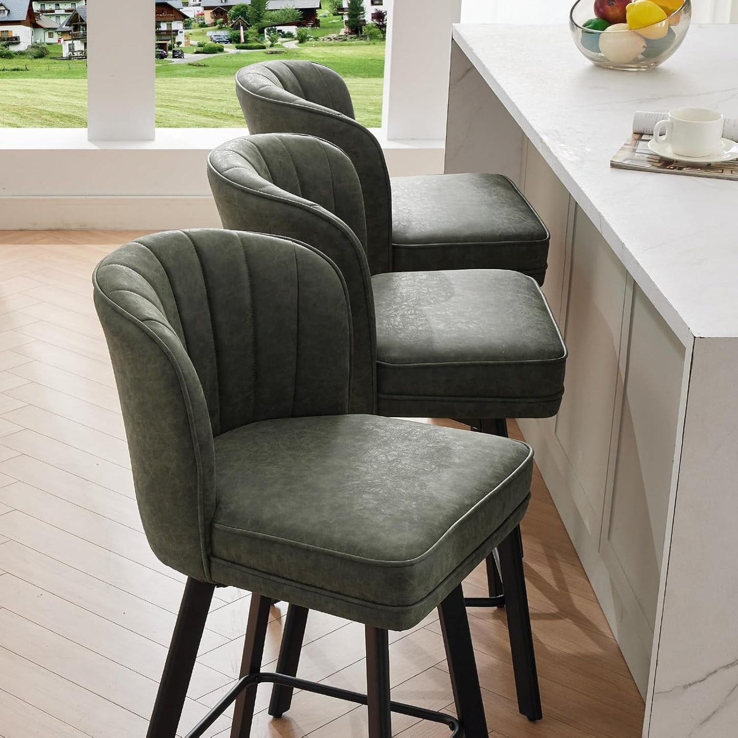 Swivel Counter Height Bar Stools Green Faux Leather in a stylish kitchen setting with wood flooring.