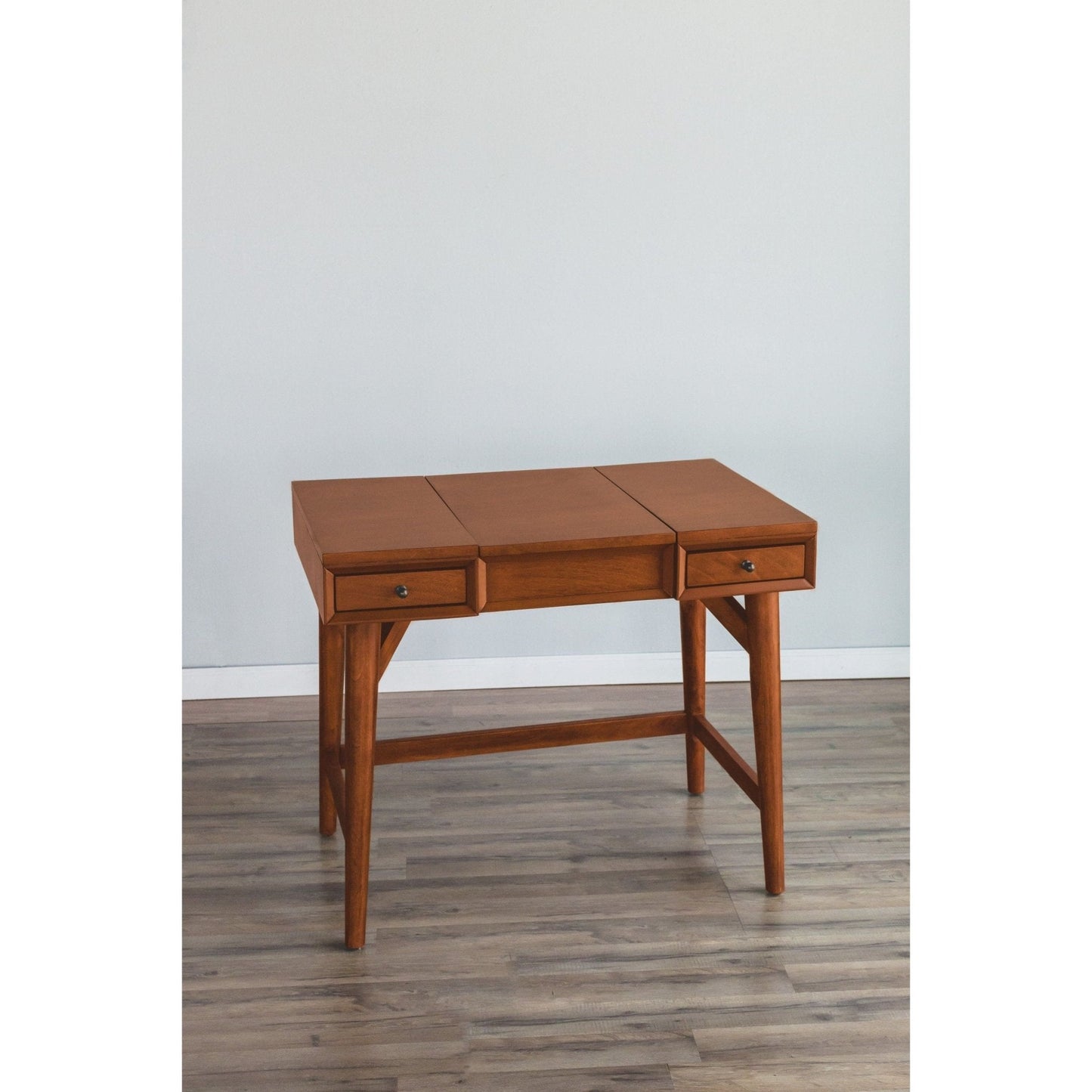 Flynn Bedroom Vanity in chestnut finish with two drawers and a large tabletop, featuring a Mid-Century design.