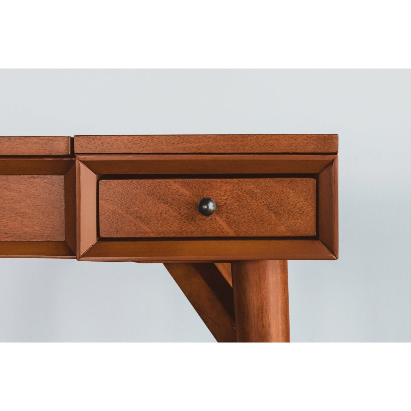 Close-up of the Flynn Bedroom Vanity showing a drawer and rich chestnut finish.