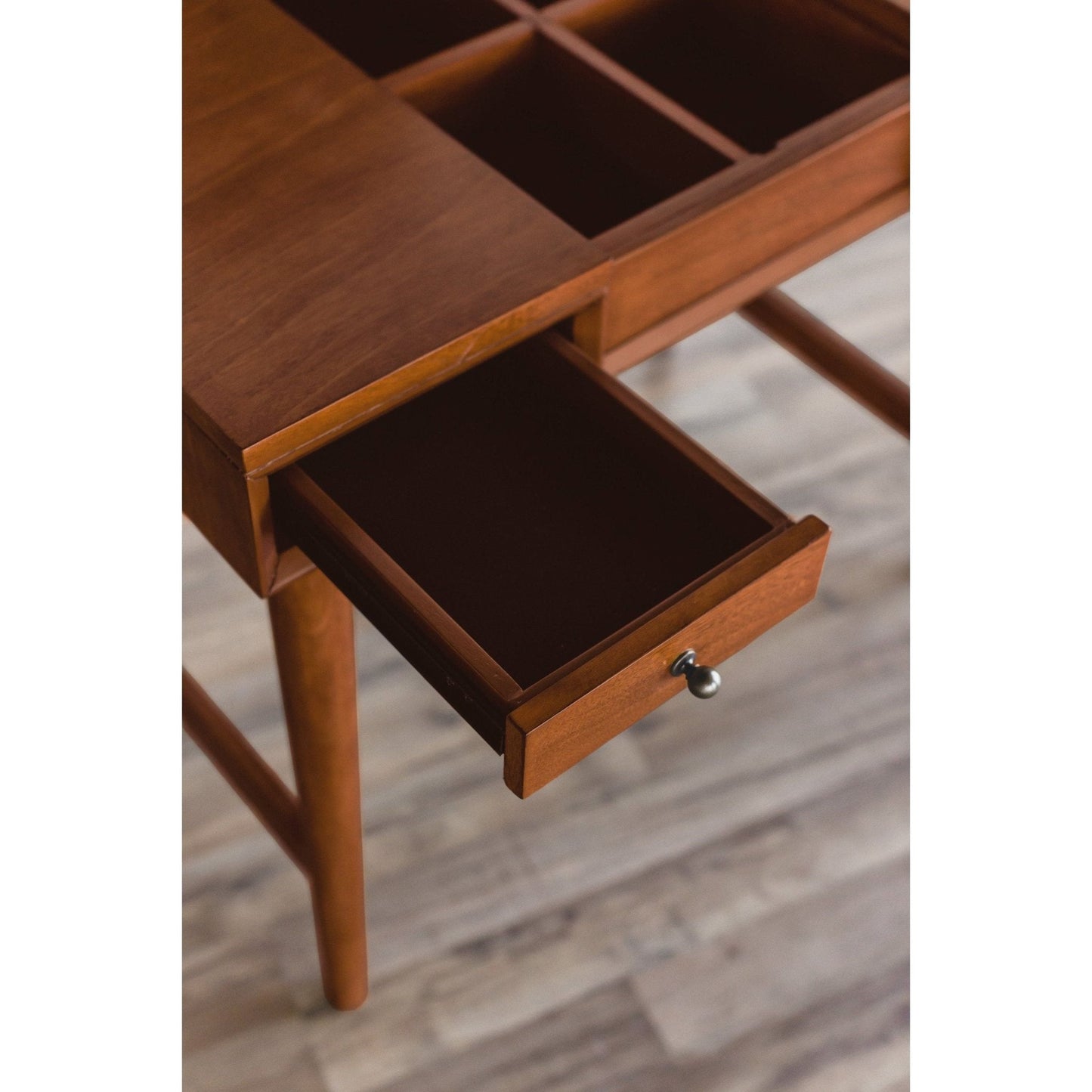 Flynn Bedroom Vanity with open drawer and large tabletop, showcasing the Mid-Century design and chestnut finish.