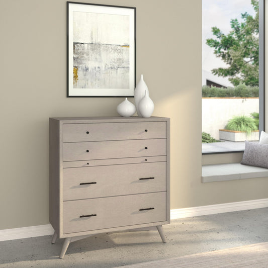 Flynn Chest in Gray, featuring four drawers and Mid-Century Modern design in a stylish living space.