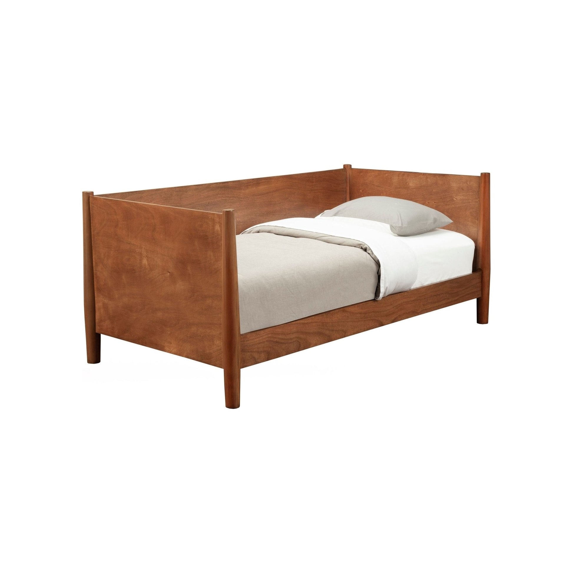 Flynn Day Bed in chestnut finish with simple, sturdy design and cozy bedding.