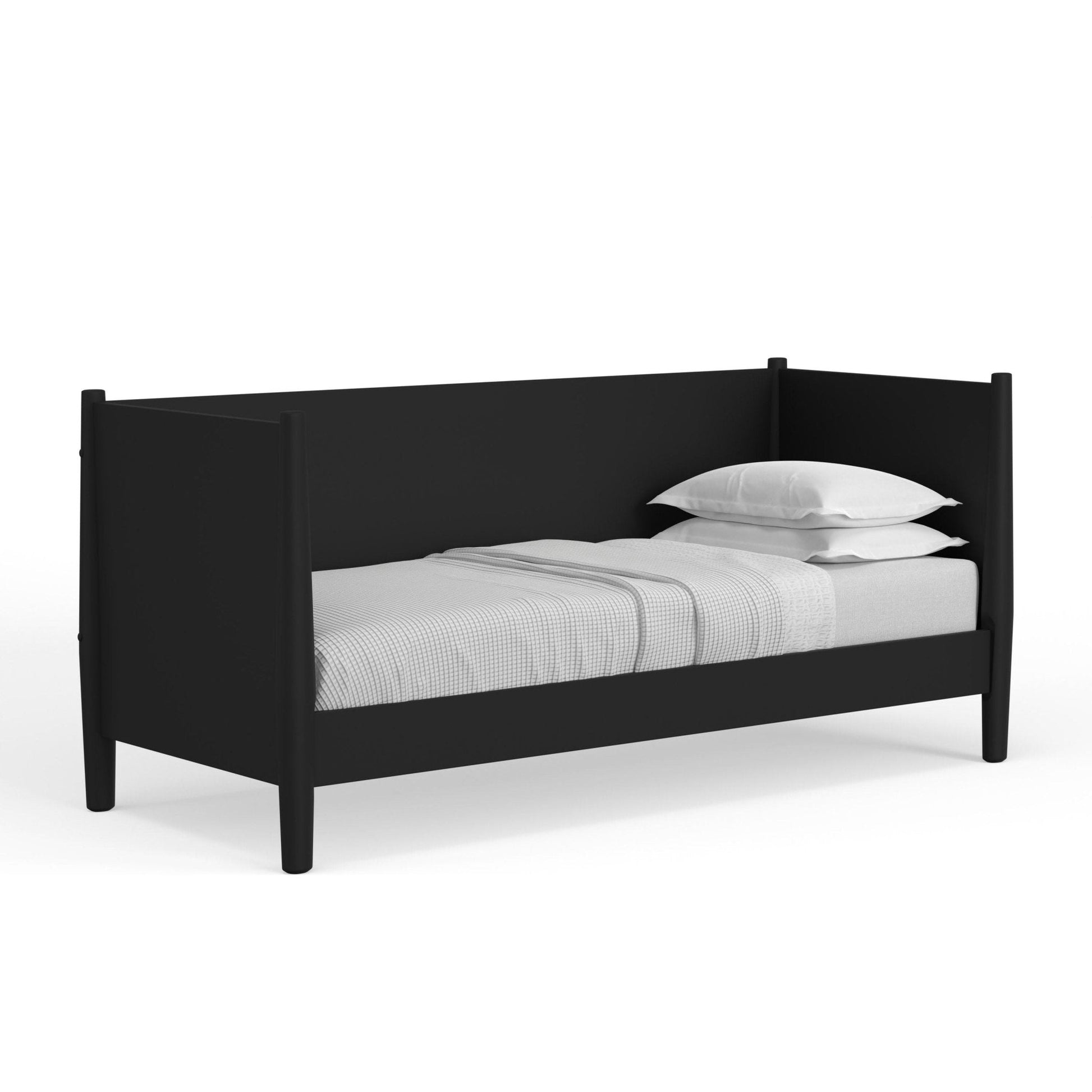 Flynn Day Bed in black with gray bedding, showcasing Mid-Century Modern design and sturdy Mahogany construction.