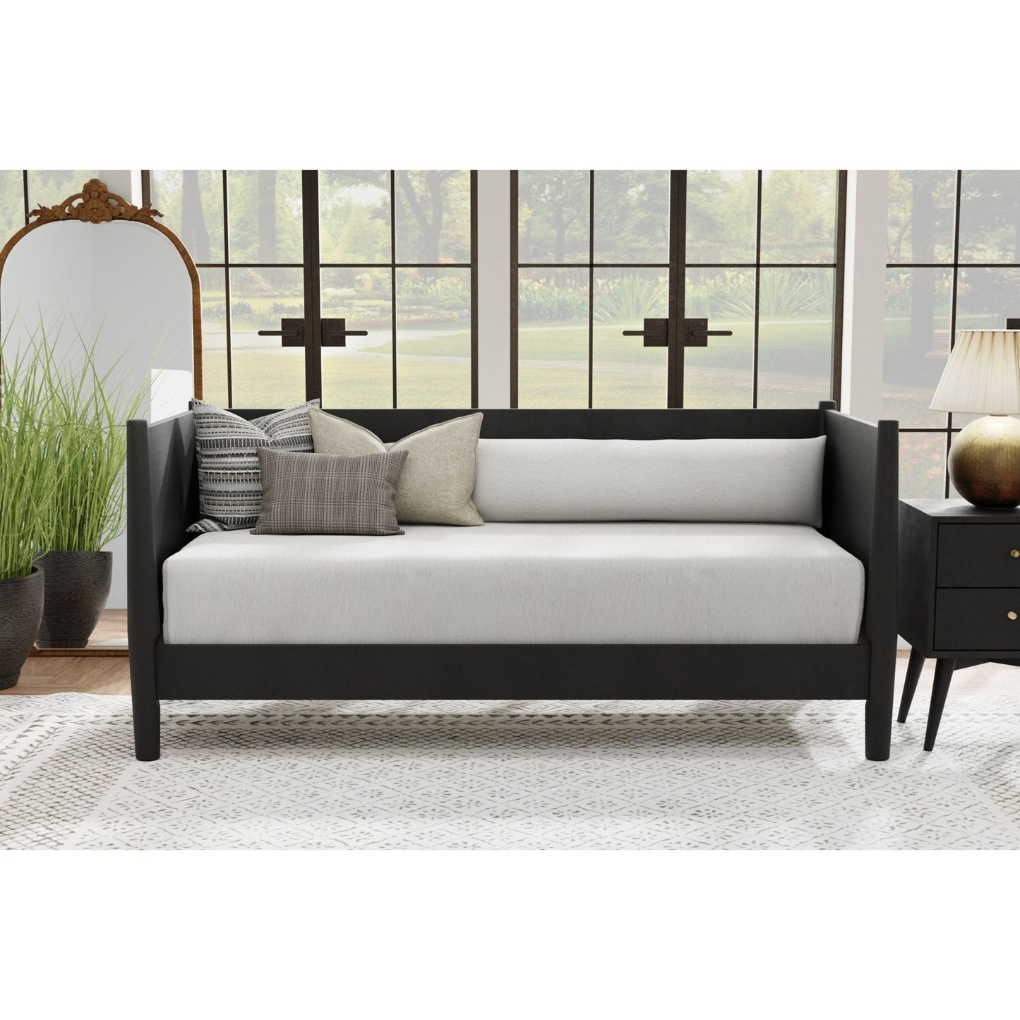 Flynn Day Bed in black with grey cushions, showcasing Mid-Century Modern style and sturdy solid Mahogany construction.