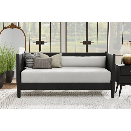 Flynn Day Bed in black with grey cushions, showcasing Mid-Century Modern style and sturdy solid Mahogany construction.
