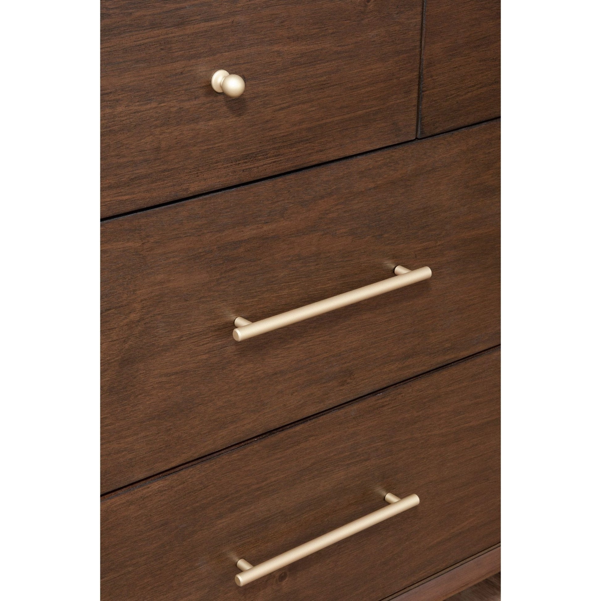 Close-up of Flynn Dresser, Walnut, showcasing its metallic handles and rich wood texture.