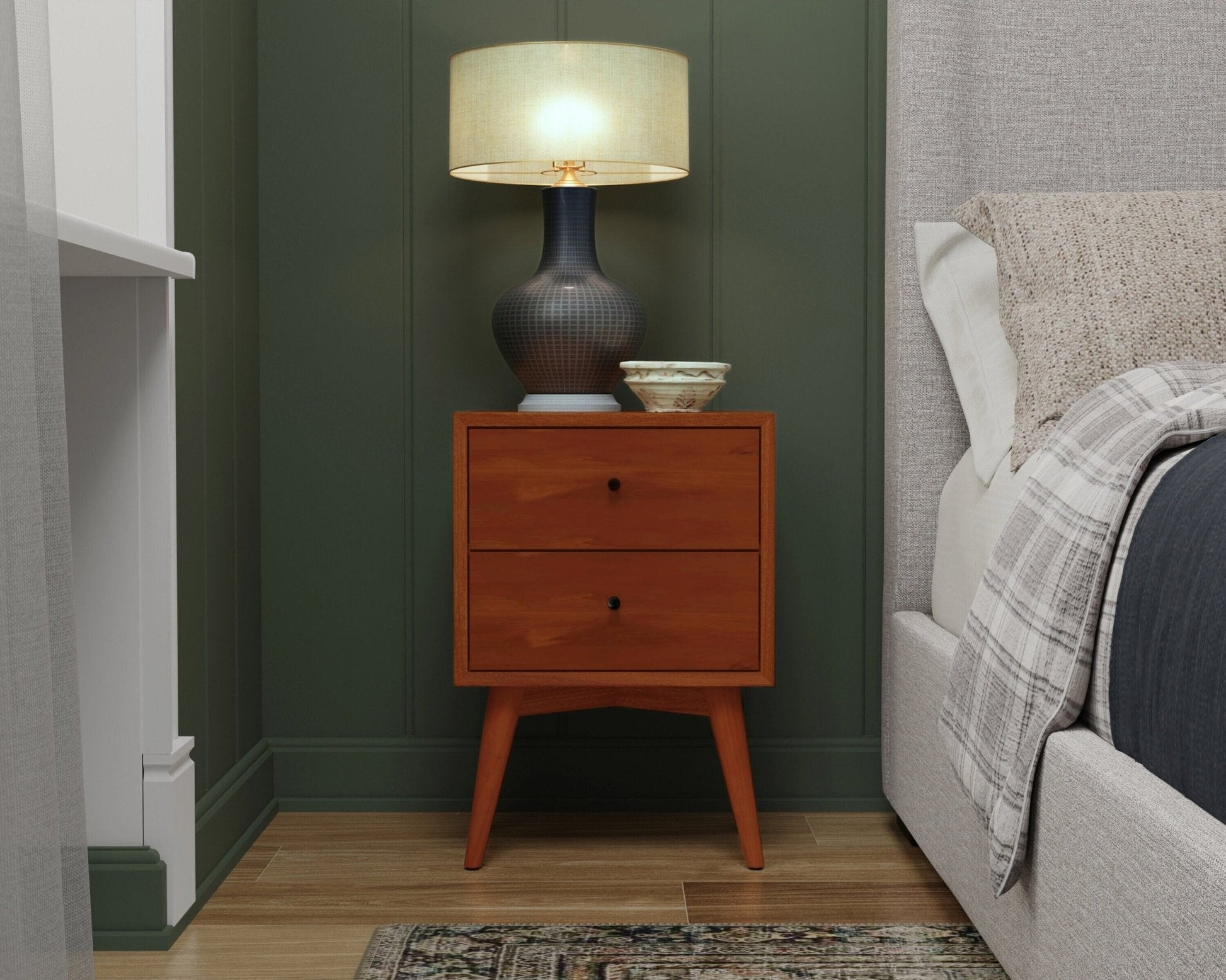 Flynn Nightstand in Chestnut color with two drawers beside a lamp and decorative bowl in a modern bedroom.