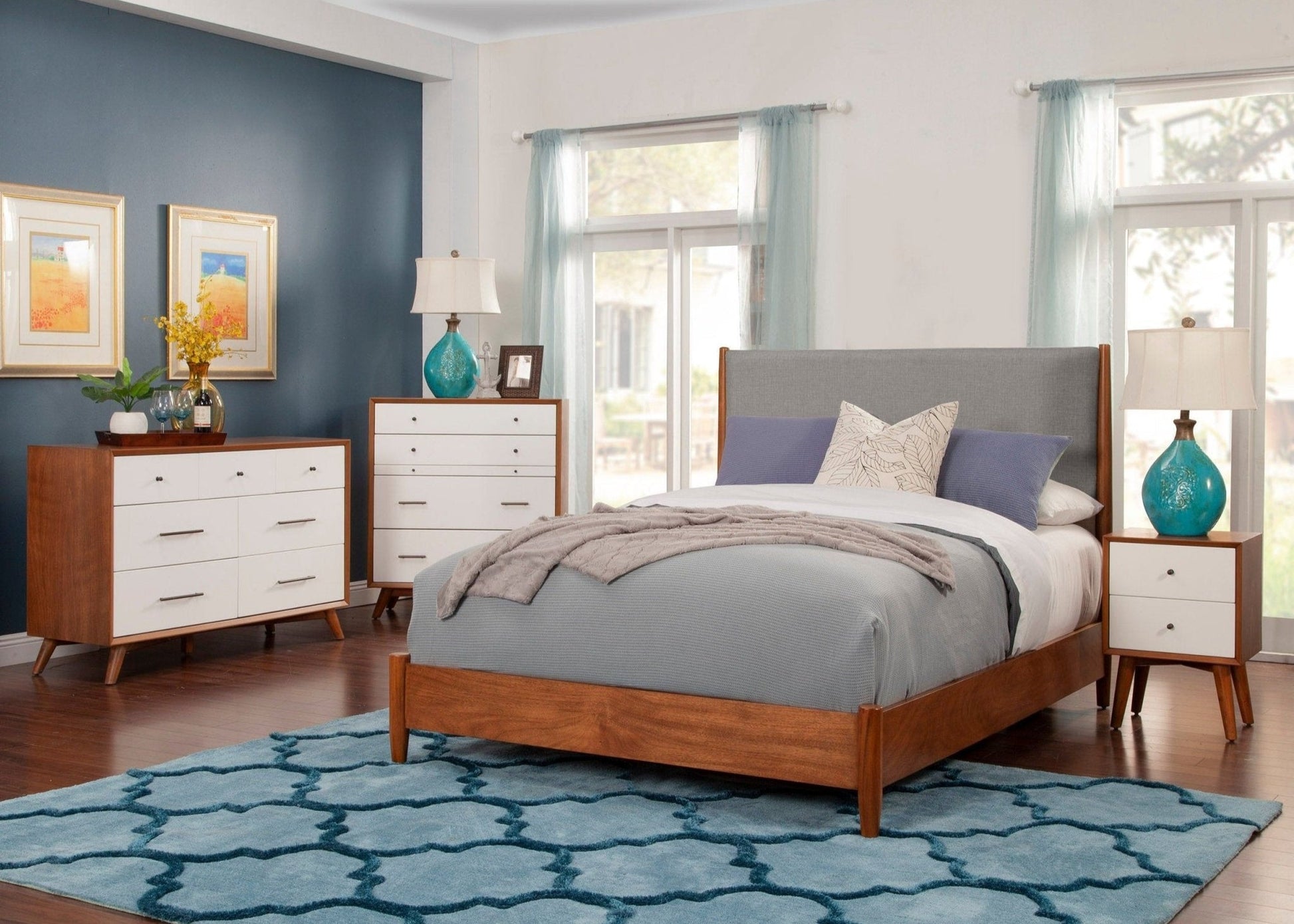 Flynn Panel Bed in Chestnut/Grey, showcasing Mid-Century Modern design with storage pieces and a cozy bedroom setting.