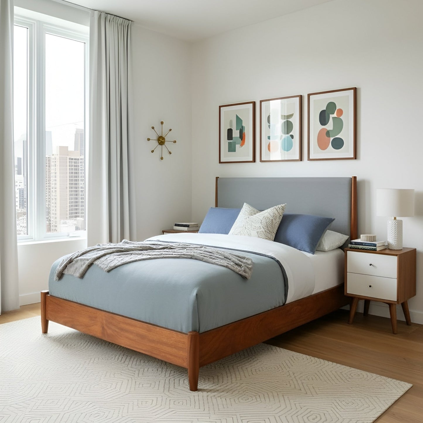 Flynn Panel Bed in Chestnut with grey bedding, modern decor and art in a bright bedroom setting.