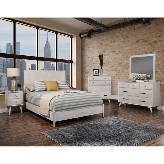 Flynn Panel Bed in a stylish bedroom setting with modern furniture and city views.