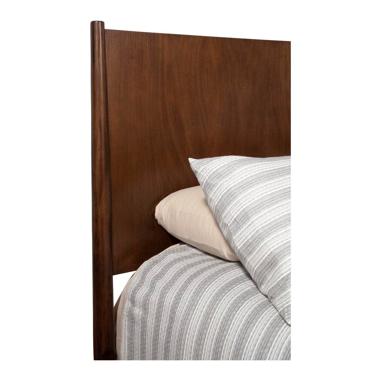 Flynn Panel Bed headboard in walnut finish with textured bedding and pillows.