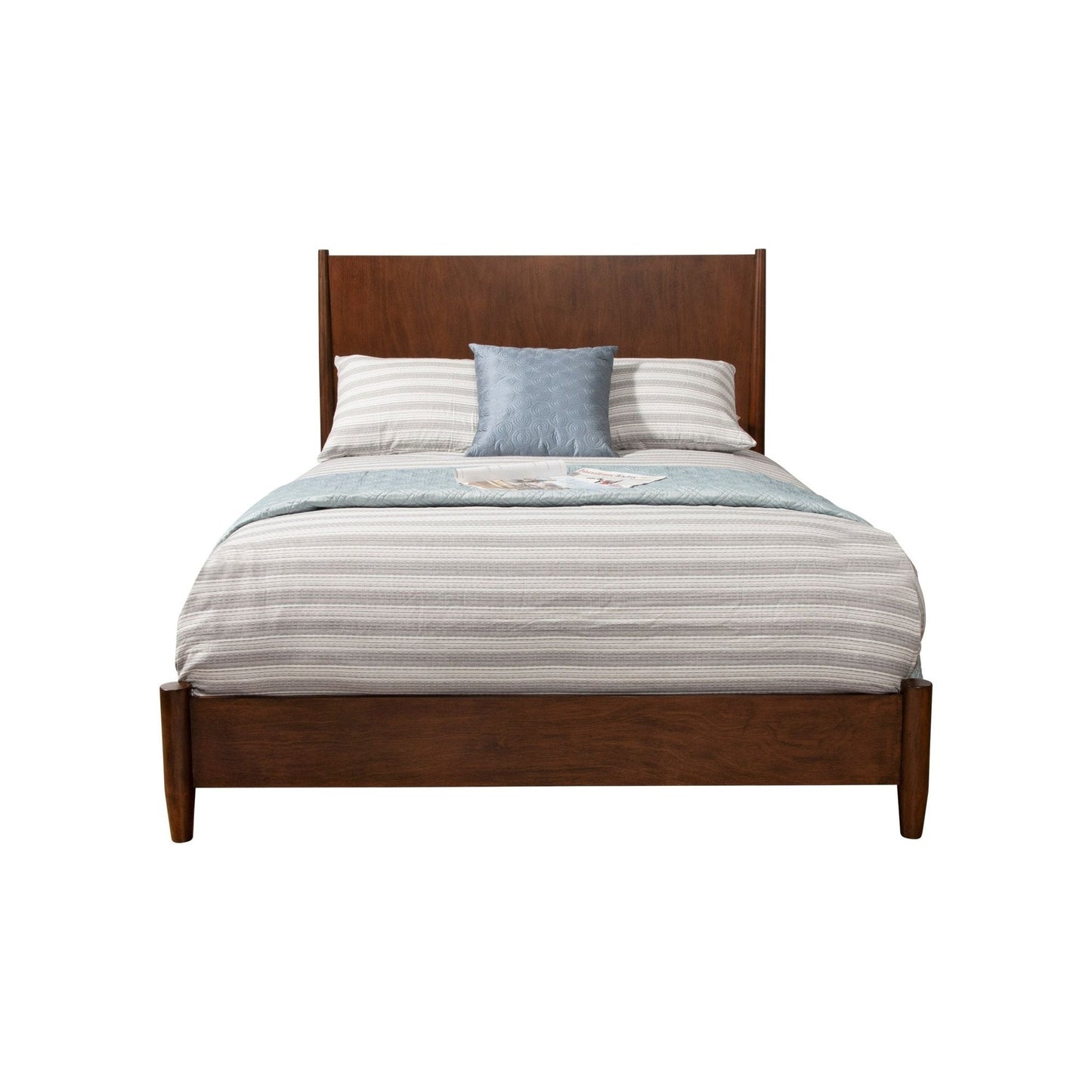 Flynn Panel Bed in Walnut featuring a modern design with a striped comforter and decorative pillows.