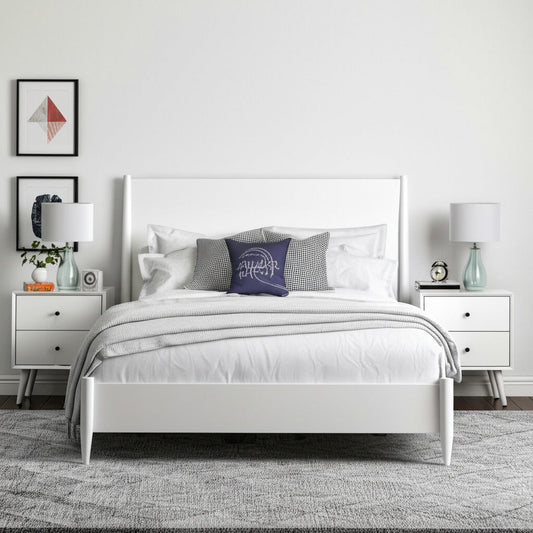 Flynn Platform Bed in white with modern decor and stylish bedside tables.