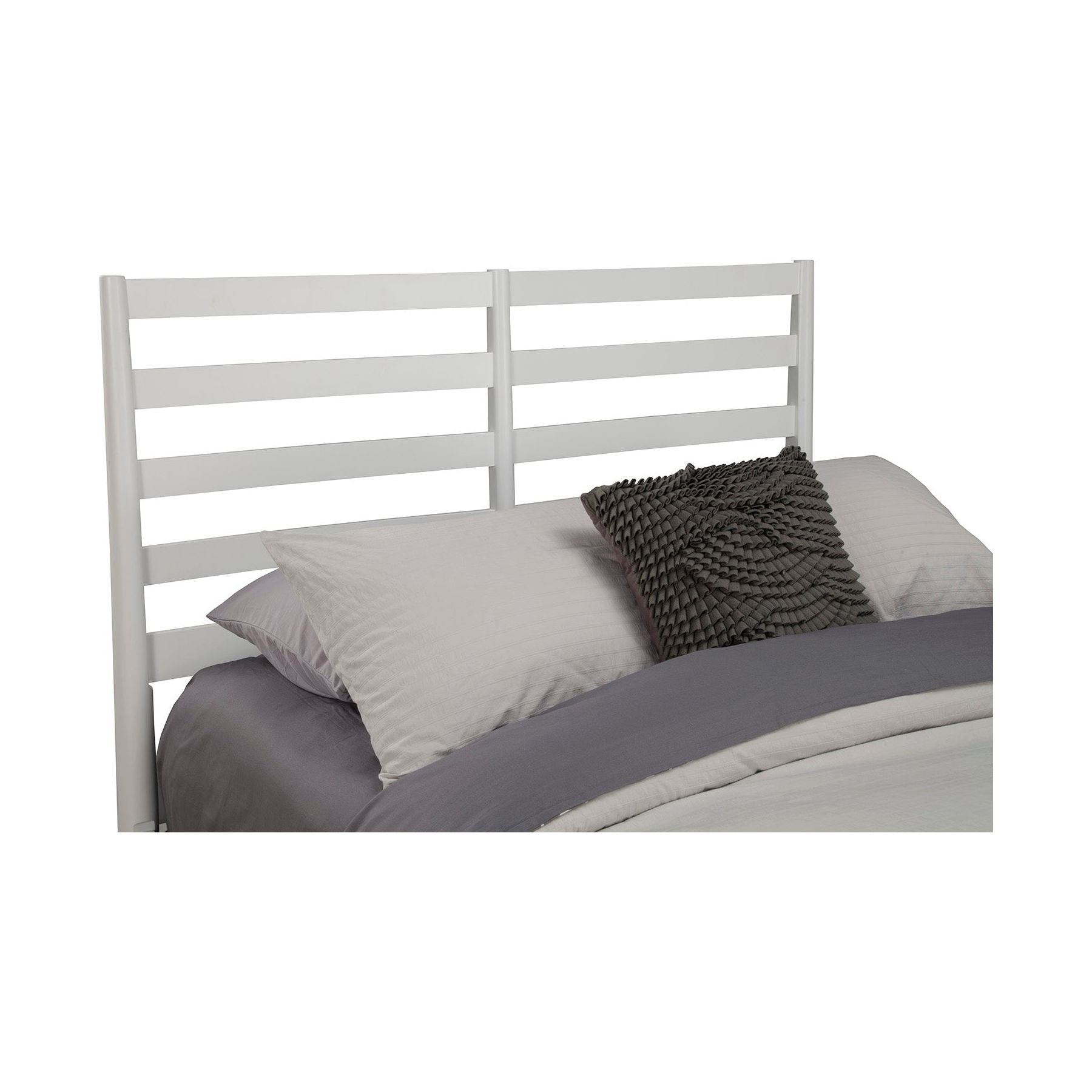Flynn Retro Bed with slat back headboard and comfortable bedding in a modern bedroom setting.