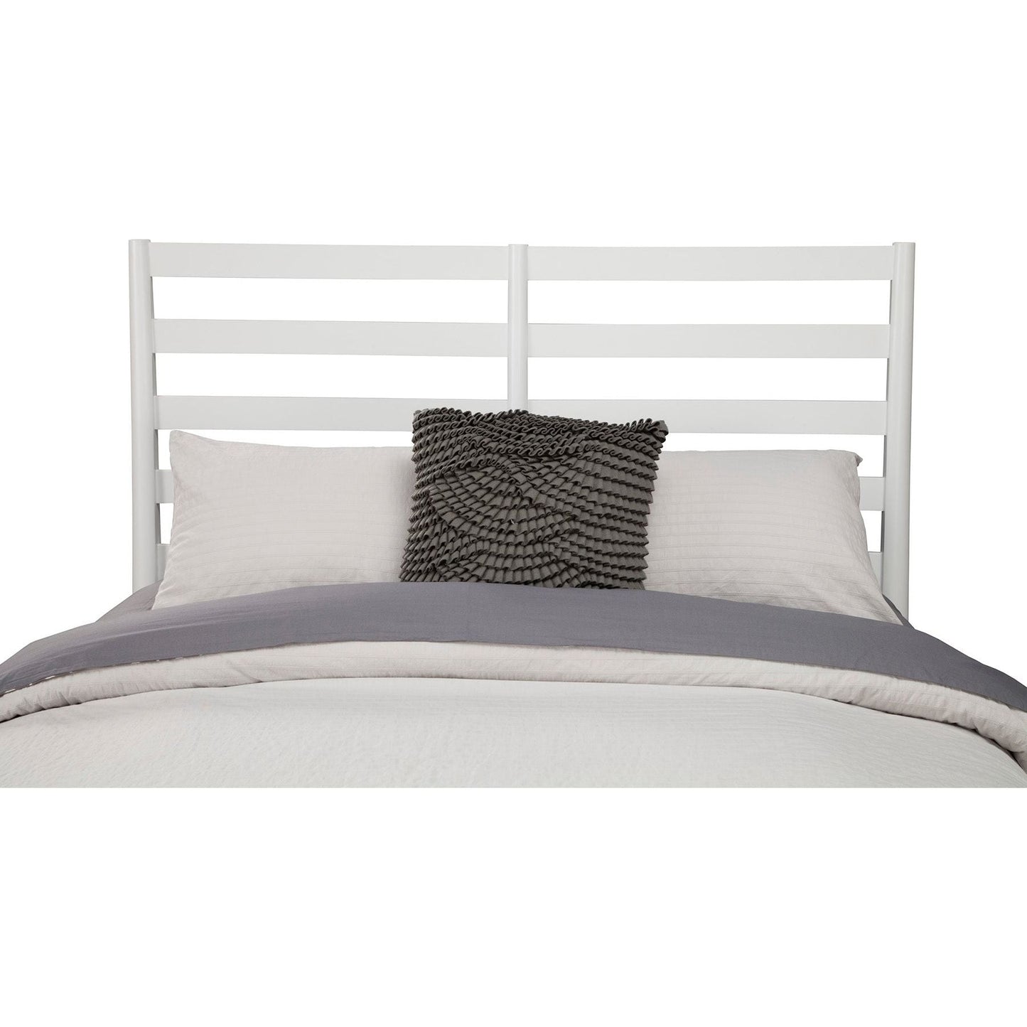 Flynn Retro Bed with a white slat back headboard and stylish bedding in a modern bedroom setting.