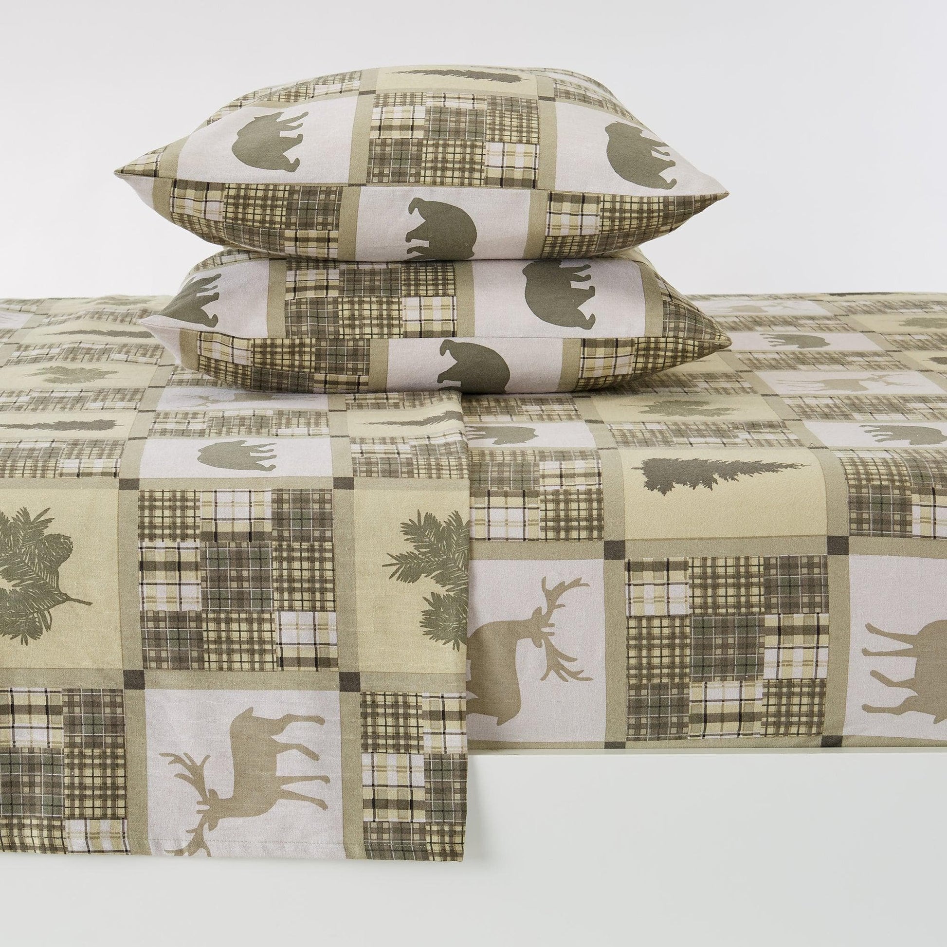 Bedding set with deer and plaid pattern on a white background
