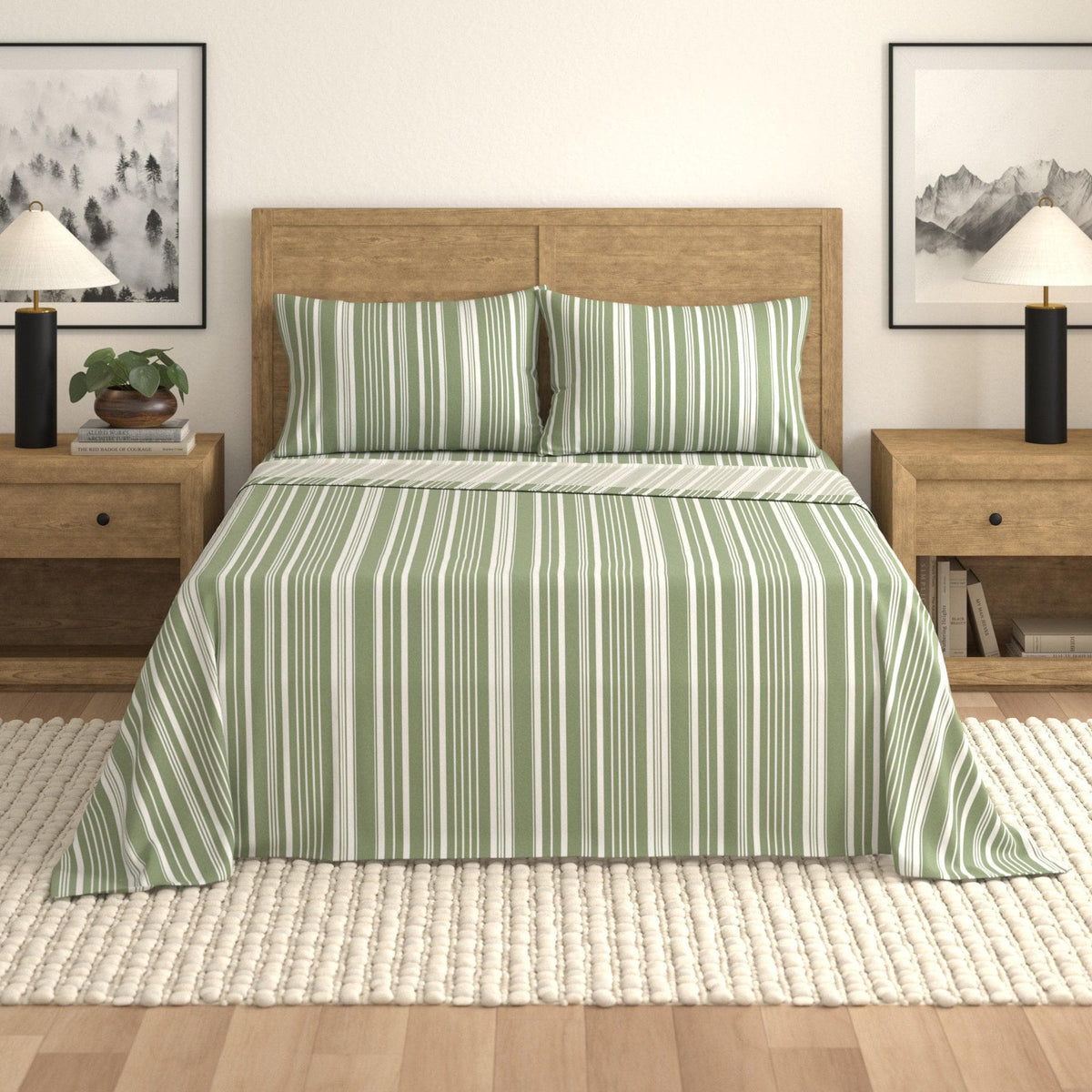 Green and white striped bedspread on a wooden bed in a bedroom setting with nightstands and lamps.