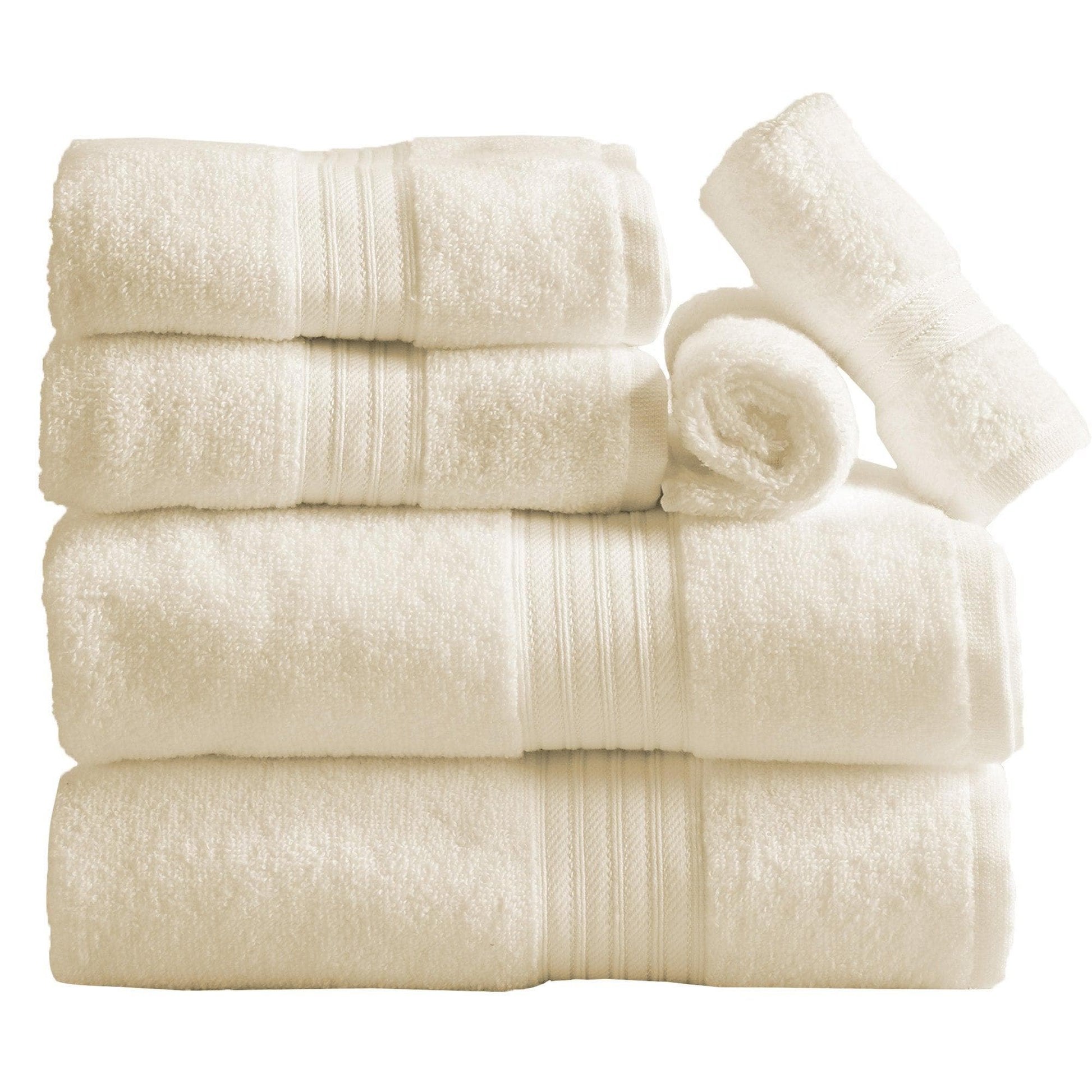 Set of cream towels including folded and rolled-up pieces on a white background
